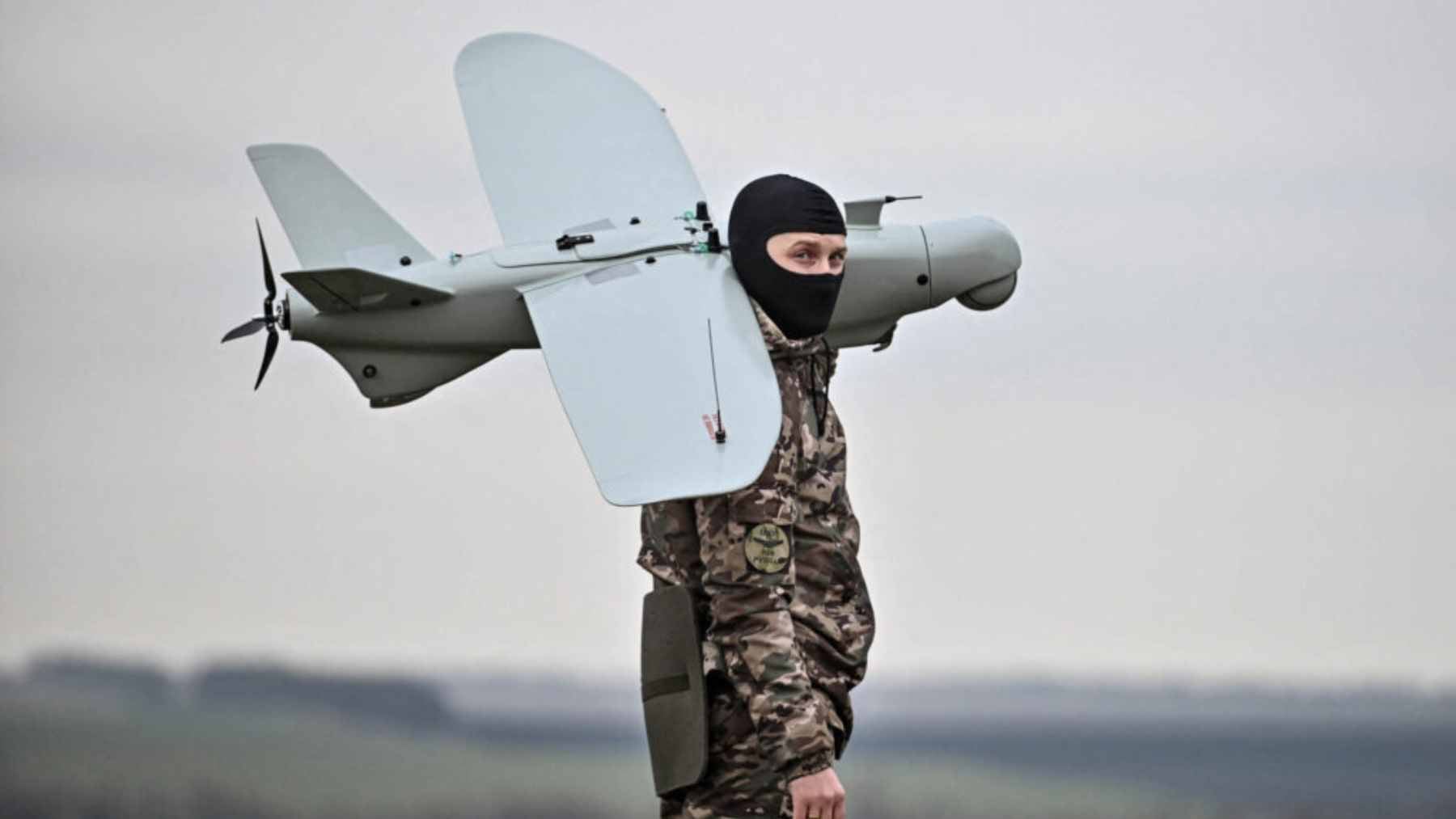 Russian soldiers being trained in the operation of FPV drones and unmanned aerial vehicles at a military center.