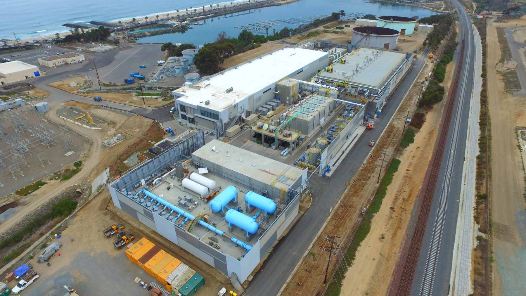 An aerial landscape view of the Claude Bud Lewis Carlsbad Desalination Plant located on the coast of San Diego County.