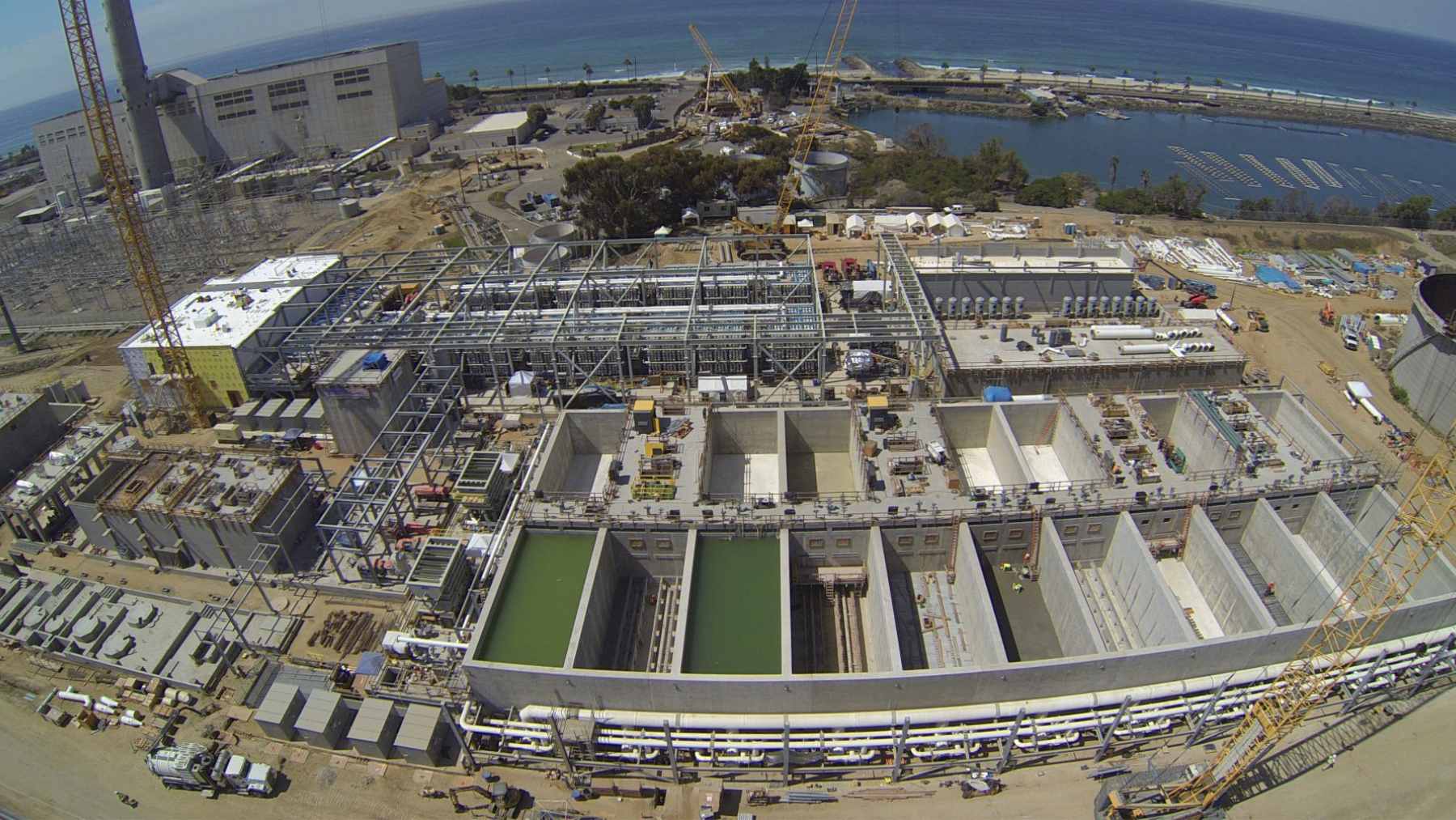 An aerial landscape view of the Claude Bud Lewis Carlsbad Desalination Plant located on the coast of San Diego County.