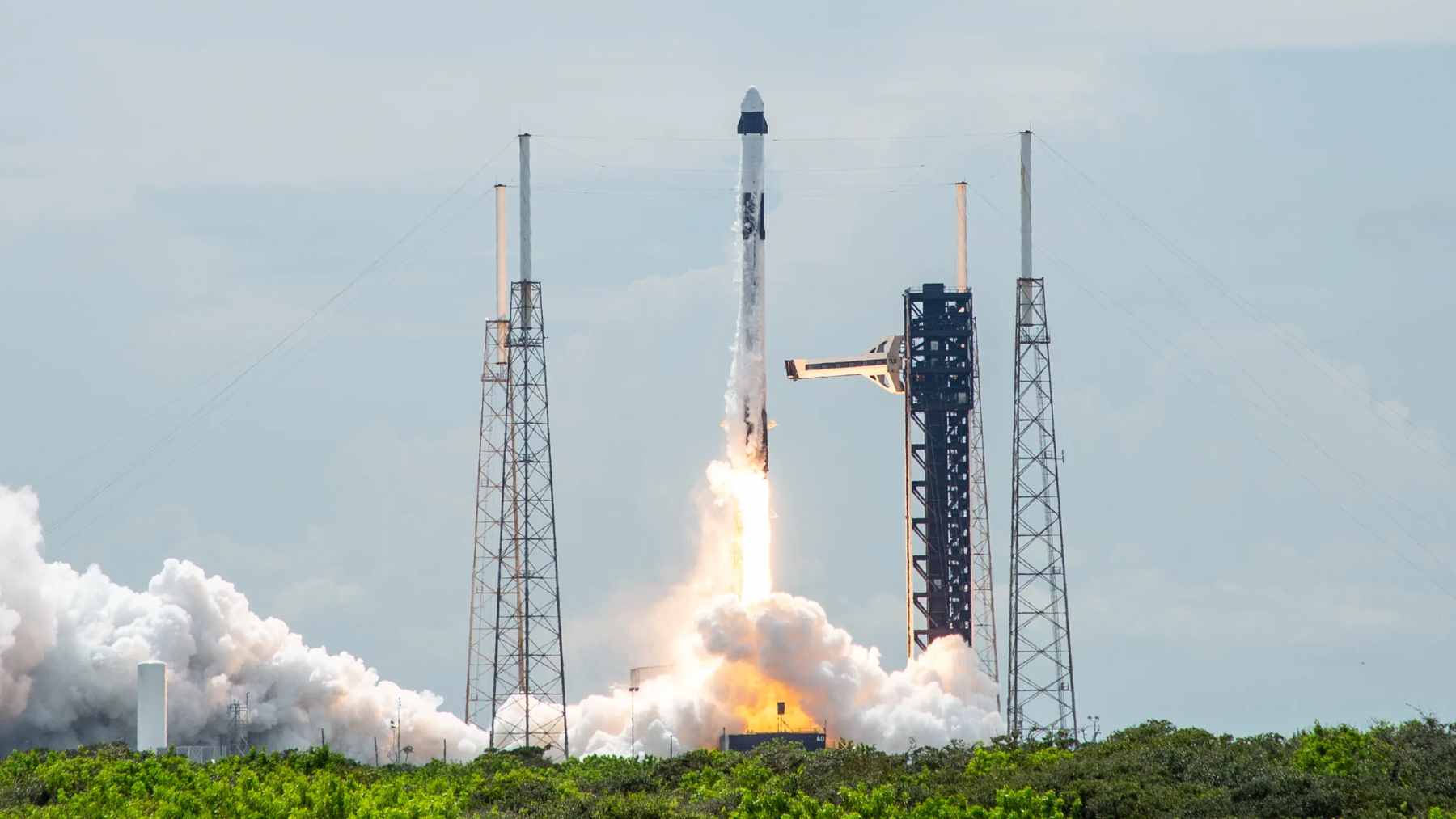 A SpaceX Falcon 9 rocket lifting off from Space Launch Complex 4 at Vandenberg Space Force Base in California.