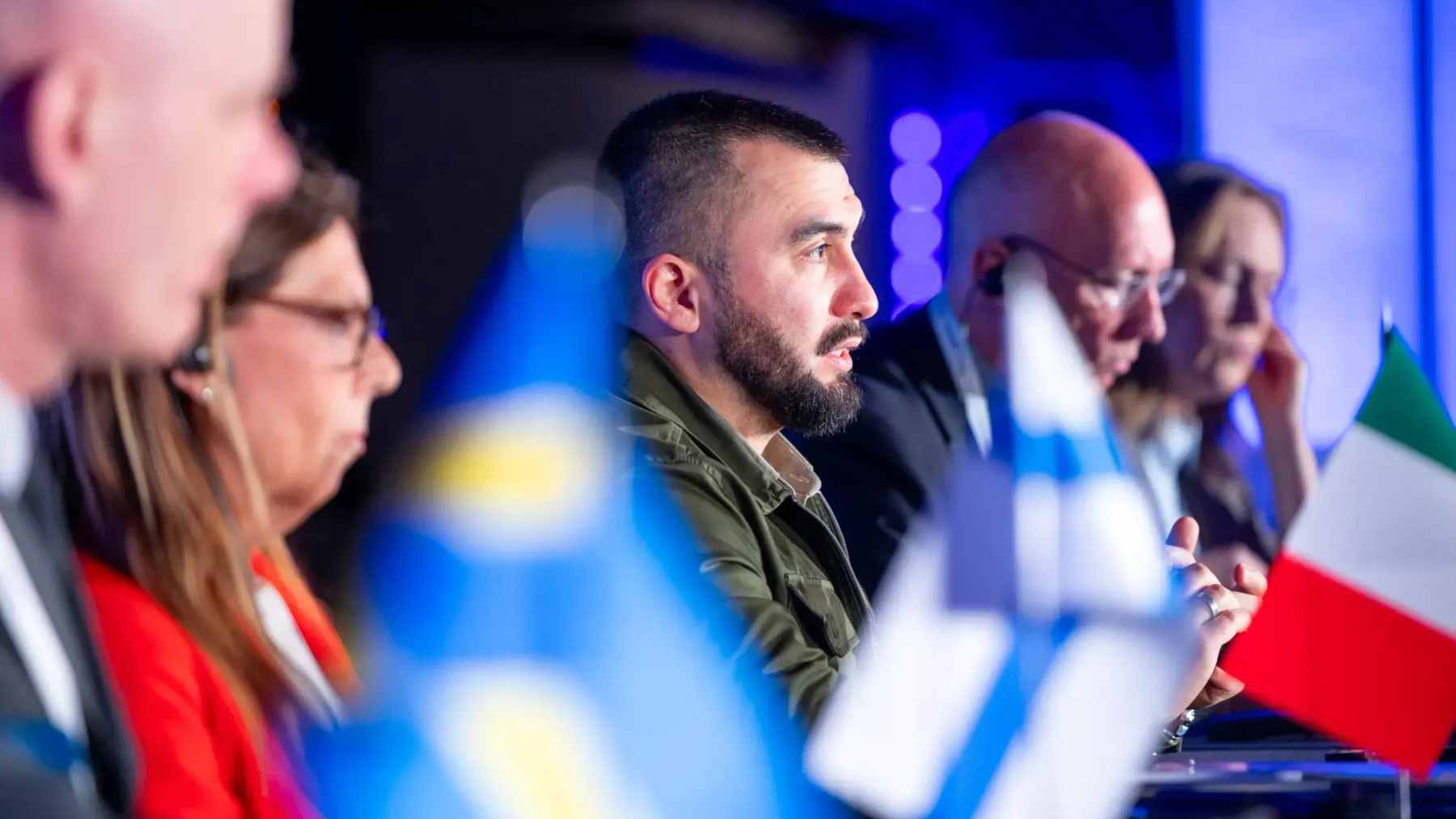 Representatives from Ukraine, Finland, Italy, Norway, Sweden, and the UK signing the CORPUS defense procurement memorandum in Kyiv.