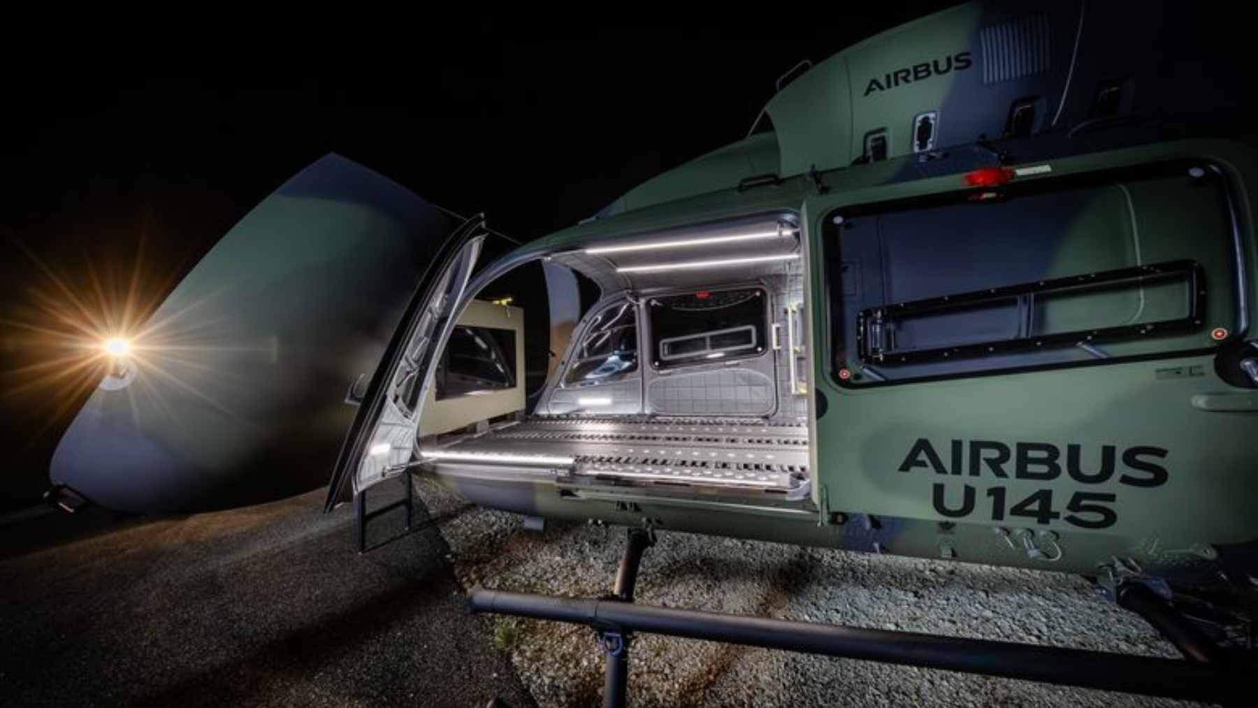 A full-scale mock-up of the Airbus U145 autonomous helicopter displayed at the ILA Berlin airshow, showcasing its cockpit-free design.