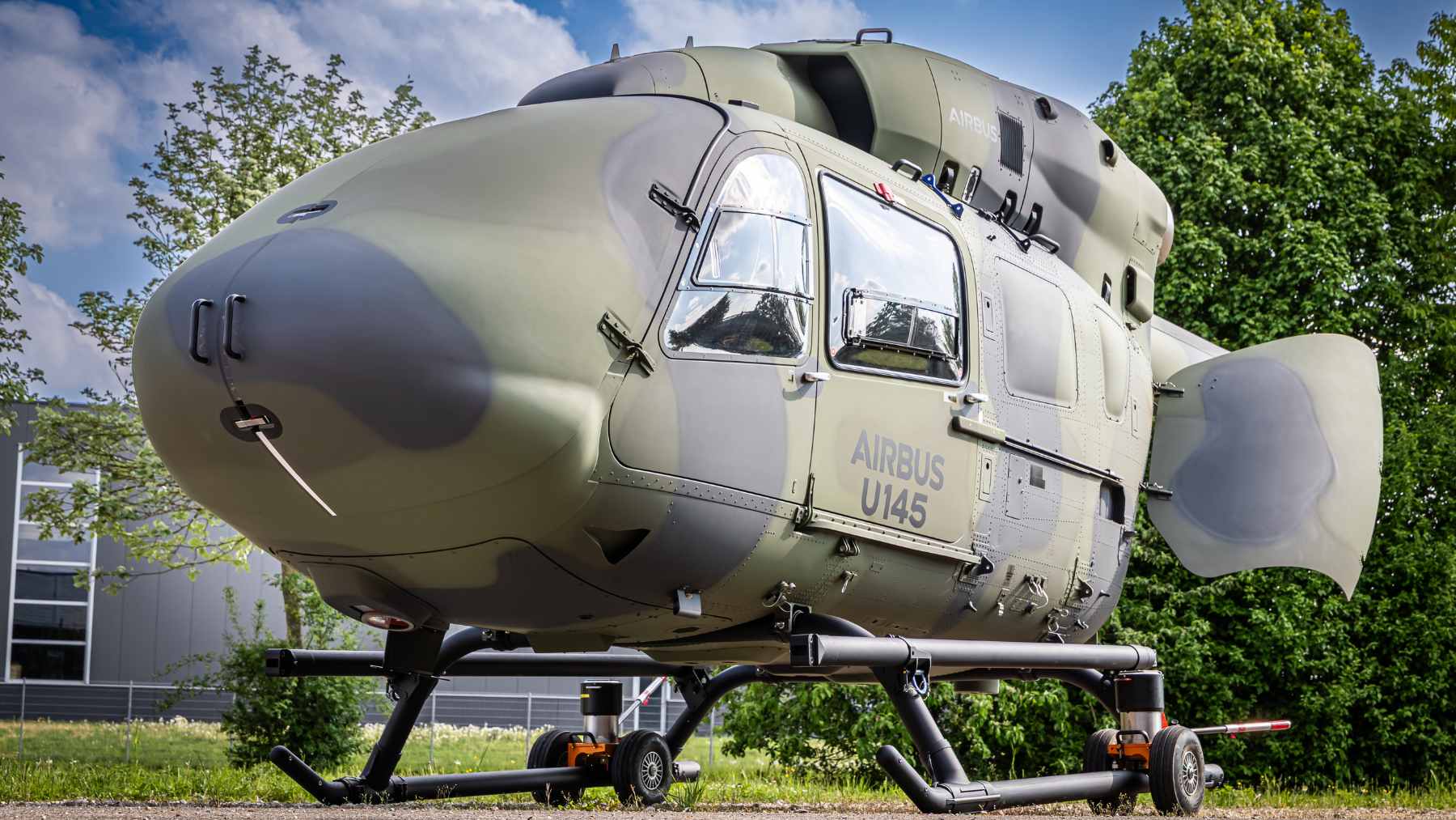 A full-scale mock-up of the Airbus U145 autonomous helicopter displayed at the ILA Berlin airshow, showcasing its cockpit-free design.