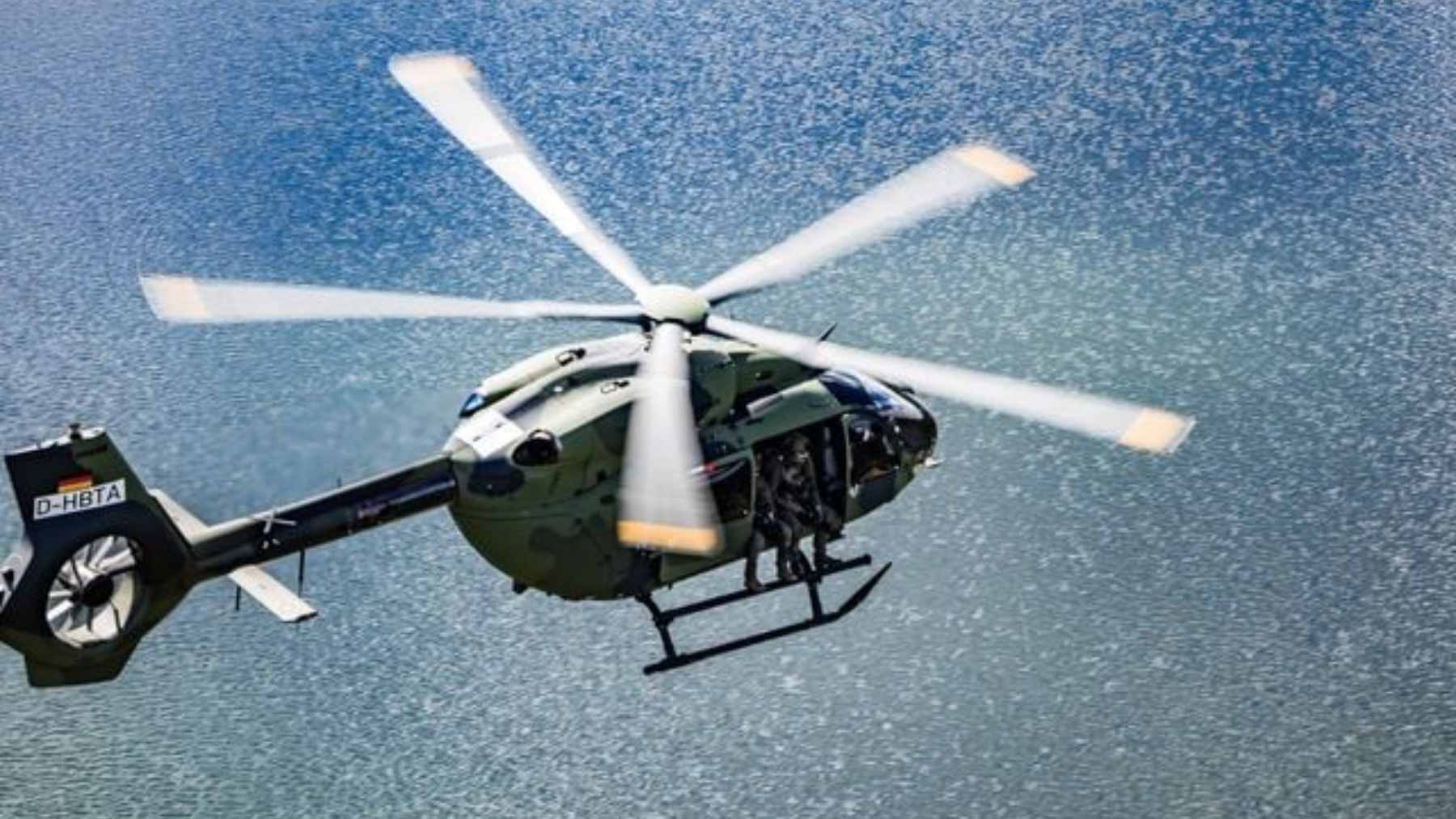 A full-scale mock-up of the Airbus U145, an autonomous uncrewed helicopter featuring a nose-loading door for cargo transport.