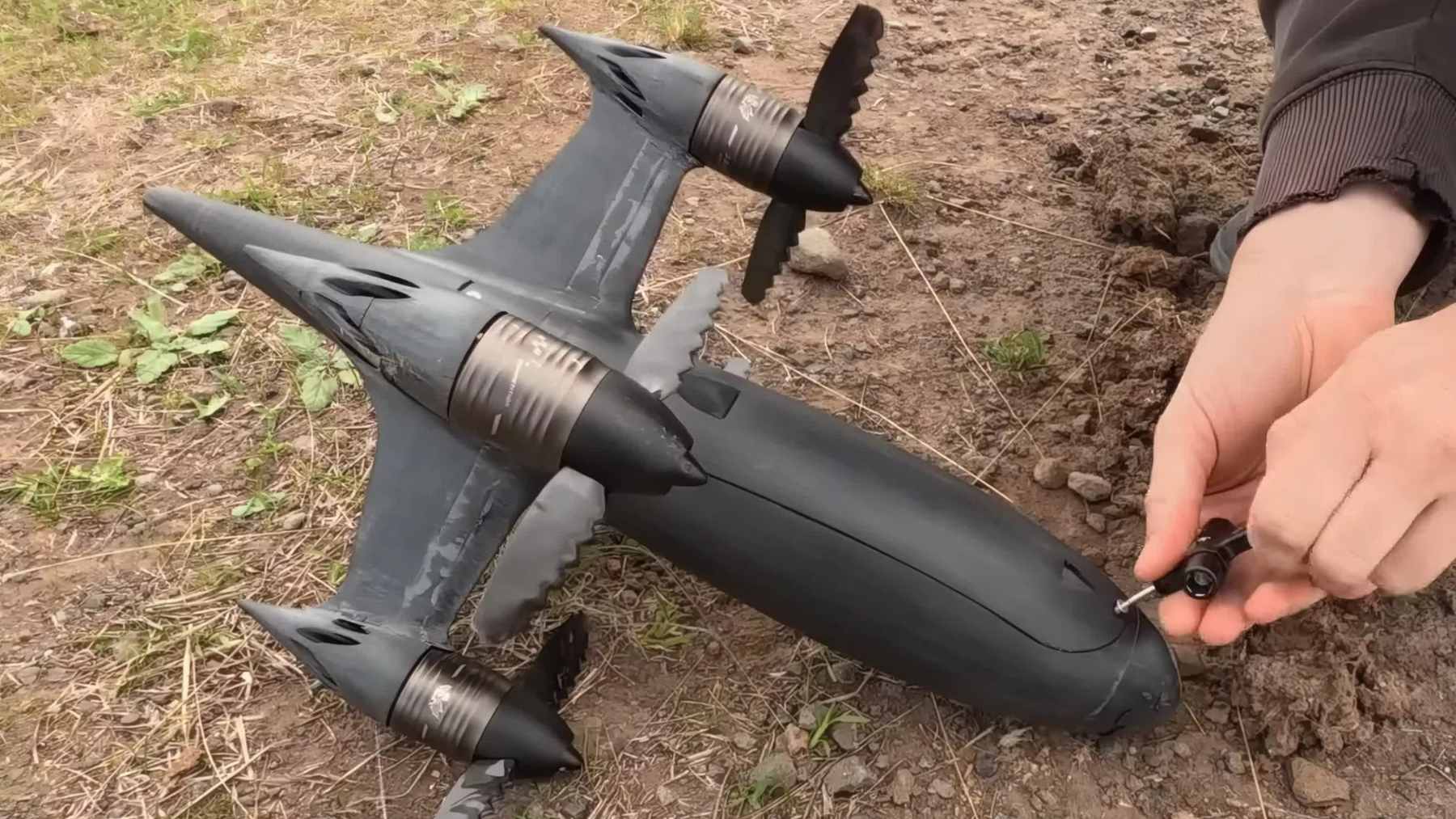 The Blackbird drone, featuring custom carbon-fiber propellers with sawtooth leading edges, during a high-speed flight test.