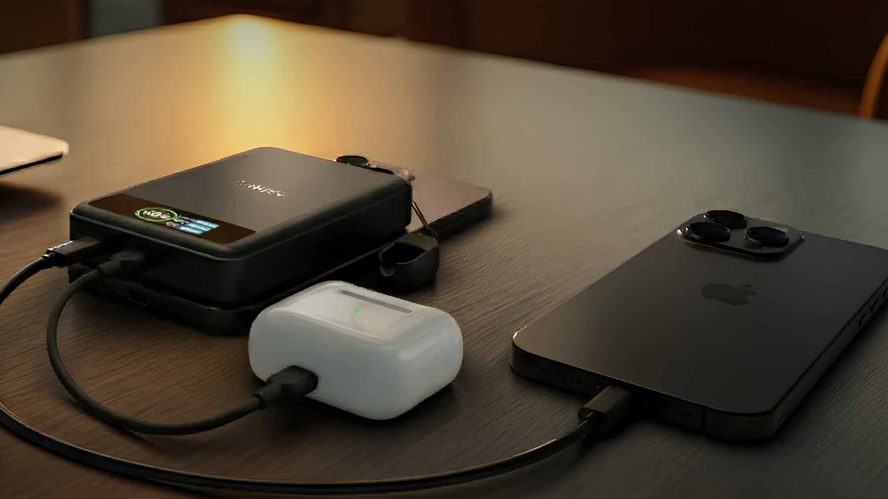 A slim, titanium-encased BMX SolidSafe magnetic power bank attached to the back of a smartphone, showcasing its ultra-thin design.