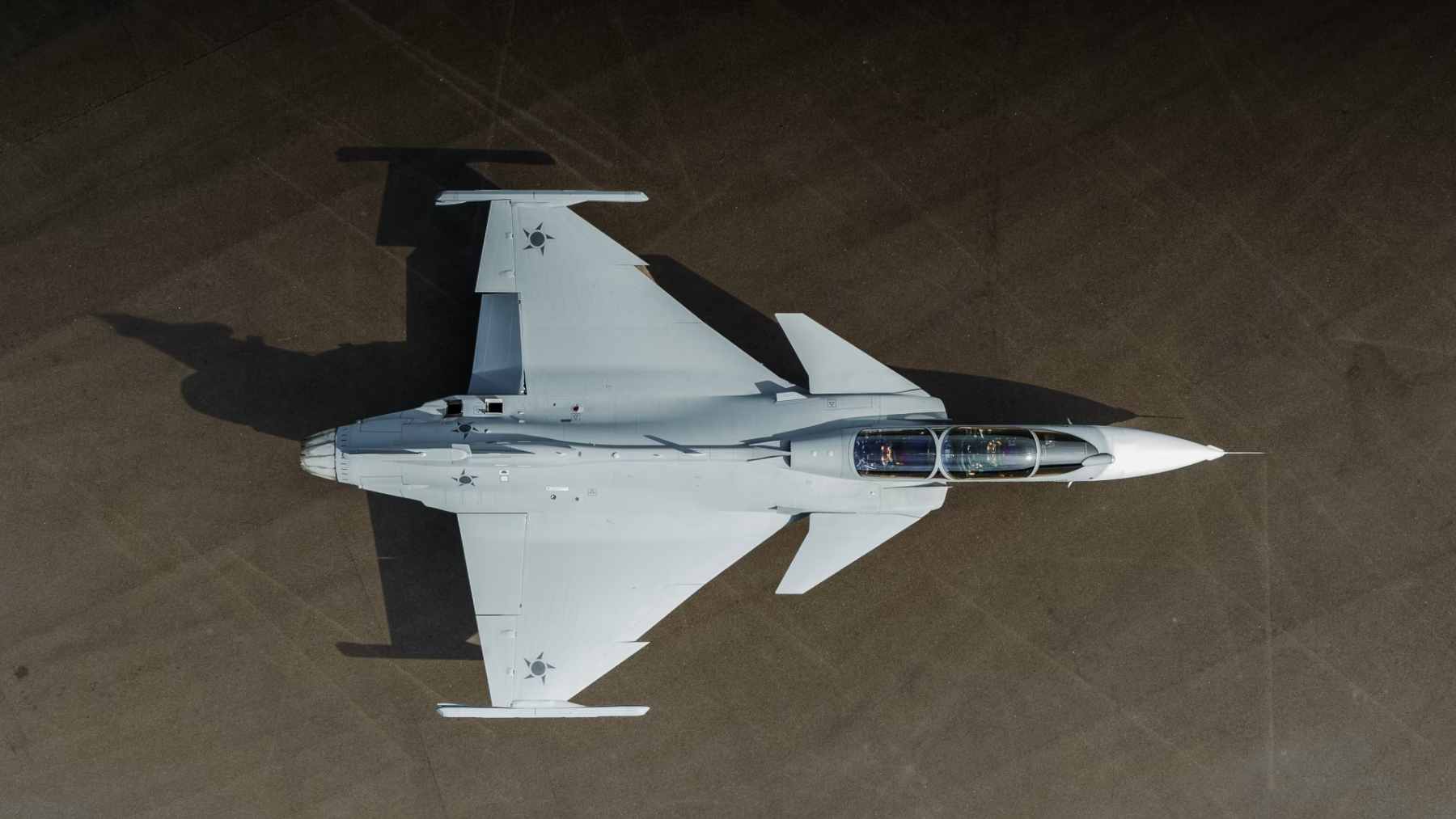 The first two-seat Saab Gripen F fighter jet developed for the Brazilian Air Force during its rollout in Linköping, Sweden.