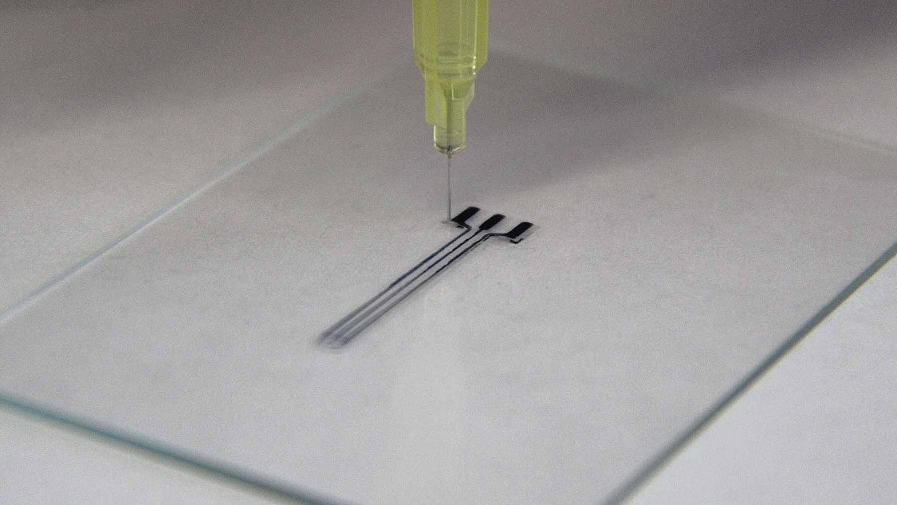 Close-up of the 3D-printed, flexible CaroFlex hydrogel implant designed to attach to a carotid artery for blood pressure regulation.