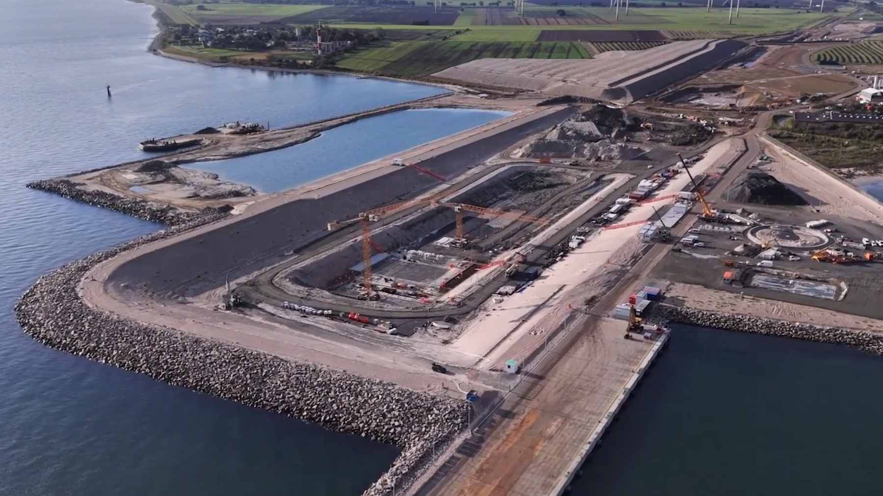 The first 81,000-ton concrete tunnel element being lowered into the Baltic Sea for the Fehmarnbelt fixed link project.