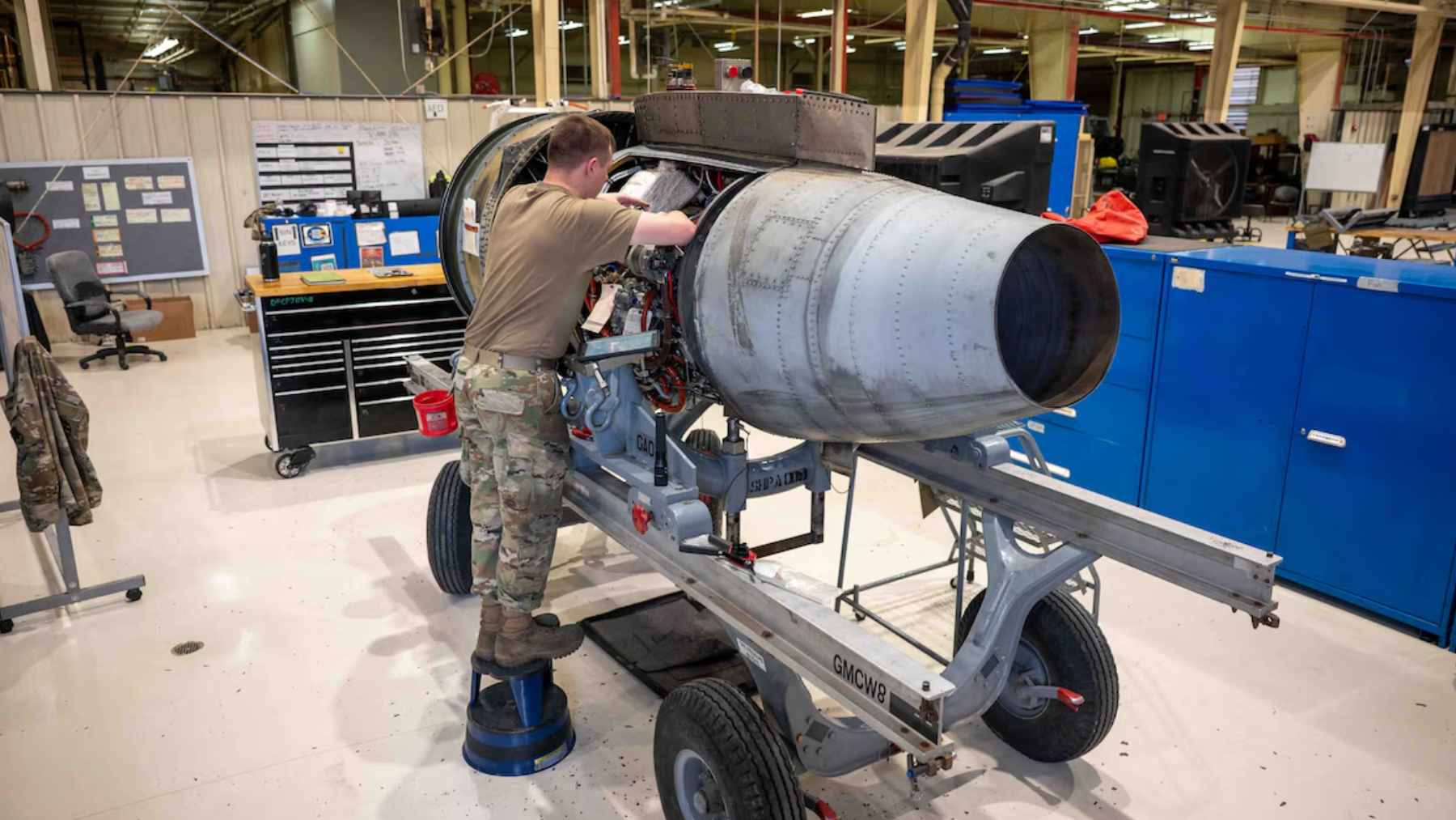 Airmen from the 355th Component Maintenance Squadron celebrate the completion of the final A-10 Thunderbolt II engine build at Davis-Monthan AFB.