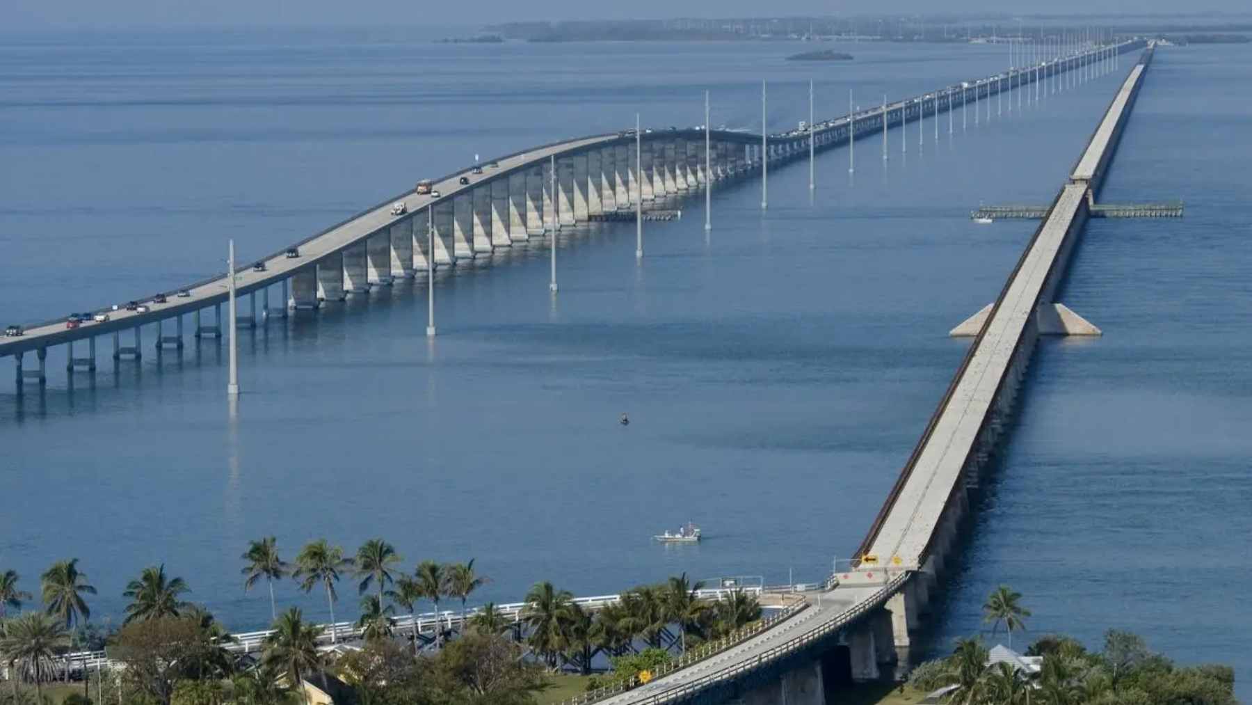The iconic Seven Mile Bridge stretching across the turquoise waters of the Florida Keys, showcasing the Overseas Highway.