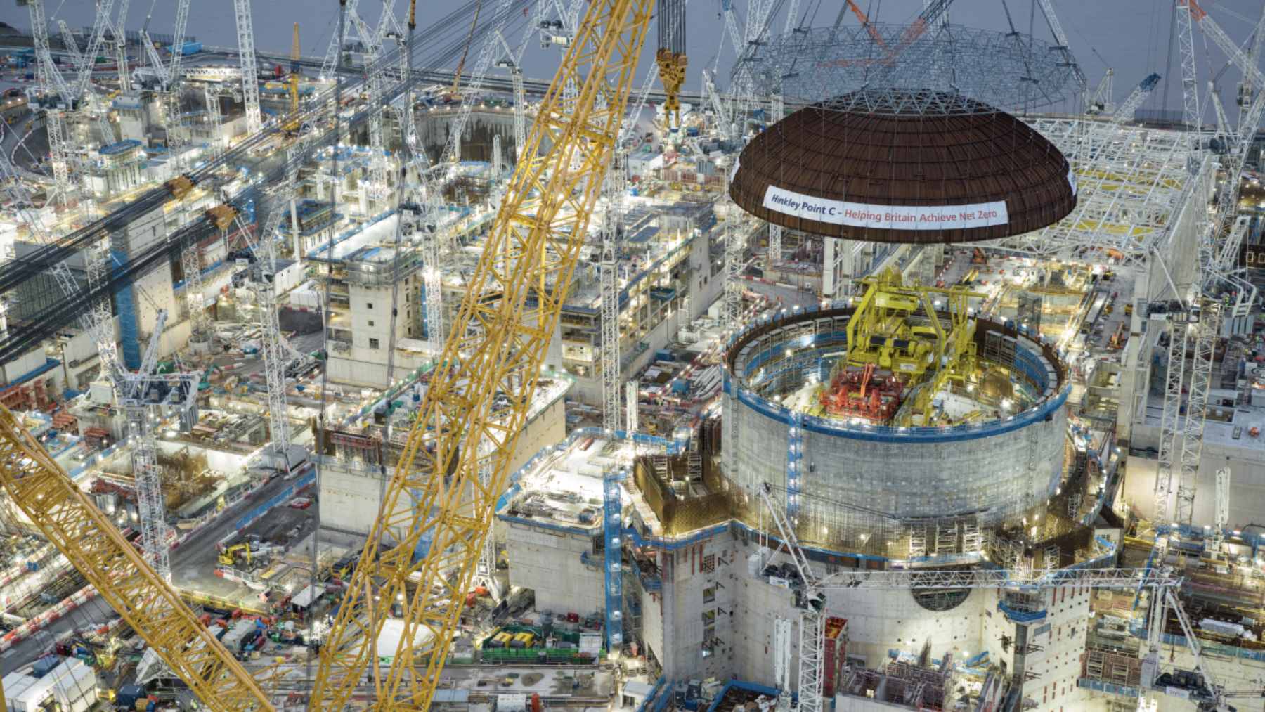 The Sarens SGC-250 crane, known as "Big Carl," lifting a massive 551-ton reactor pressure vessel into the Unit 2 reactor building at Hinkley Point C.