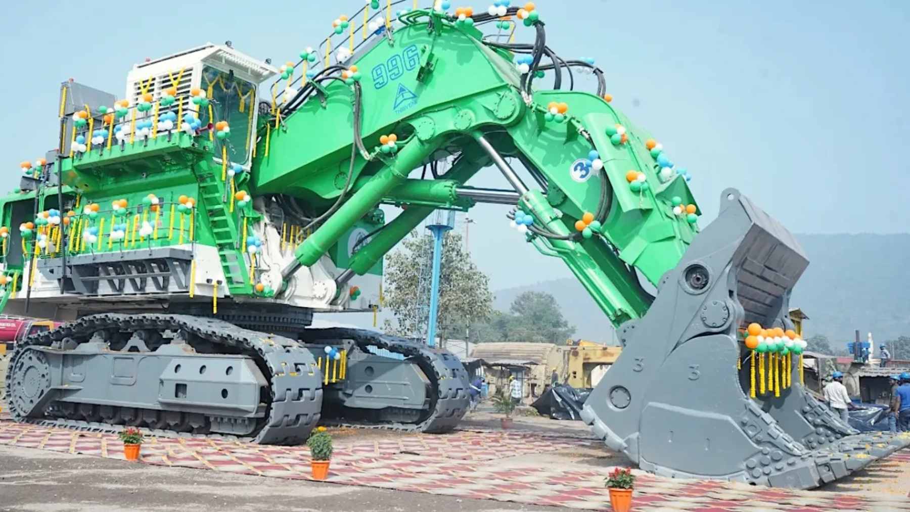 A massive electric-converted mining excavator operating in an open-pit mine, showing the power and scale of the new electric architecture.
