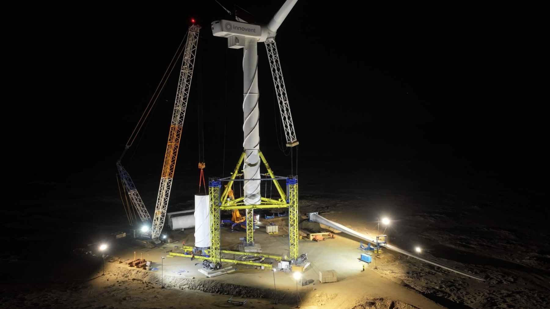 The Nabrawind Skylift system raising a Goldwind wind turbine nacelle at the InnoVent Diaz wind farm in Namibia without the use of a traditional large crane.
