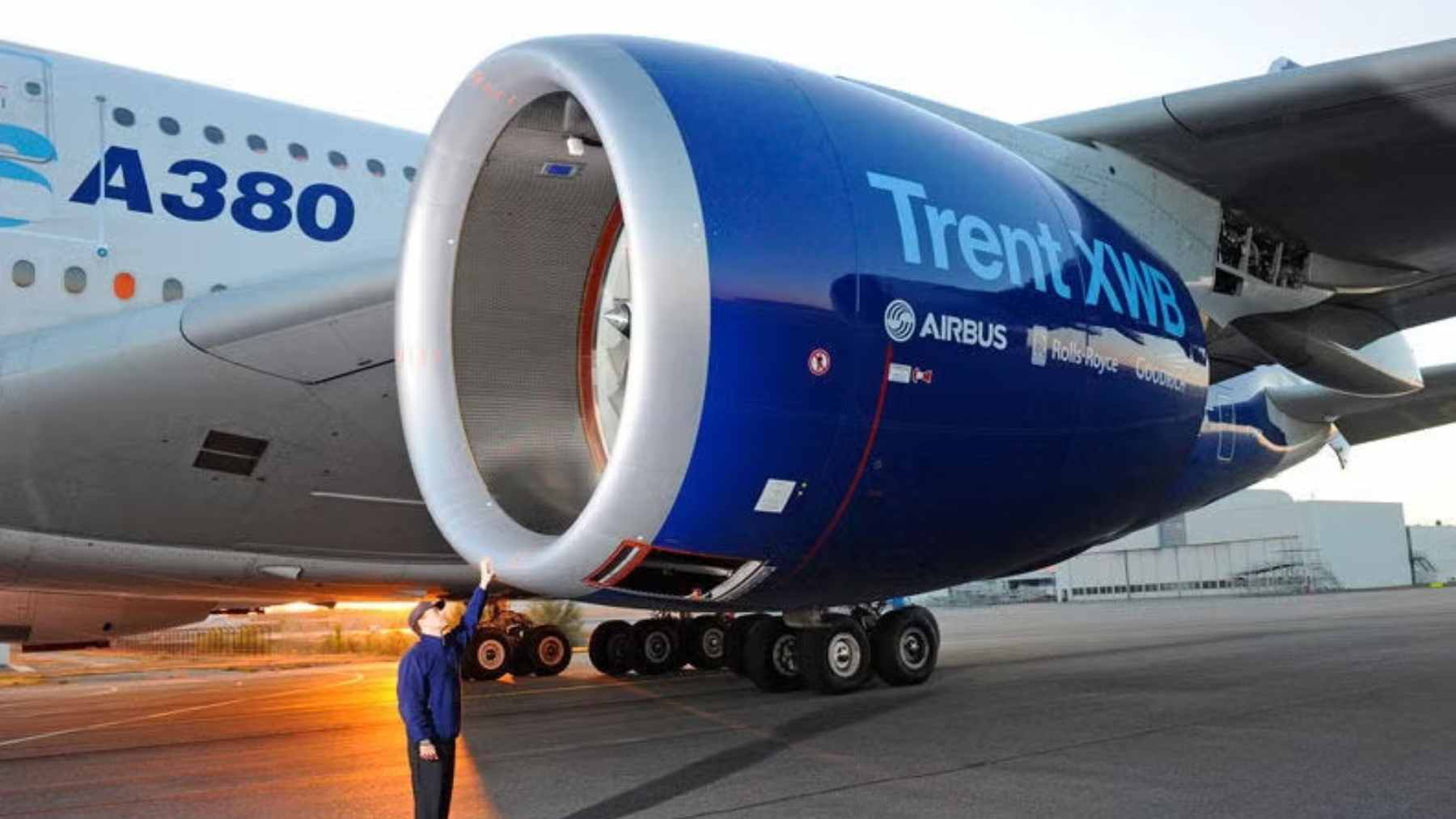 A Rolls-Royce Trent 900 turbofan engine mounted on the wing of an Airbus A380 during maintenance.