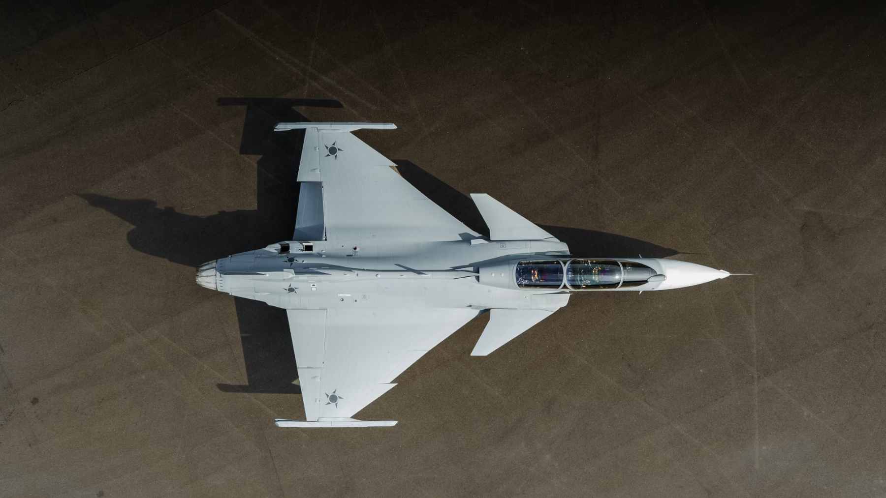 The two-seat Saab Gripen F fighter jet being unveiled during its official rollout ceremony in Linköping, Sweden.