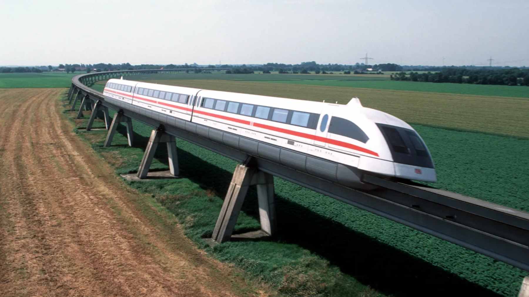 The Shanghai Maglev train, powered by German Transrapid technology, speeding along its tracks between the airport and the city center.