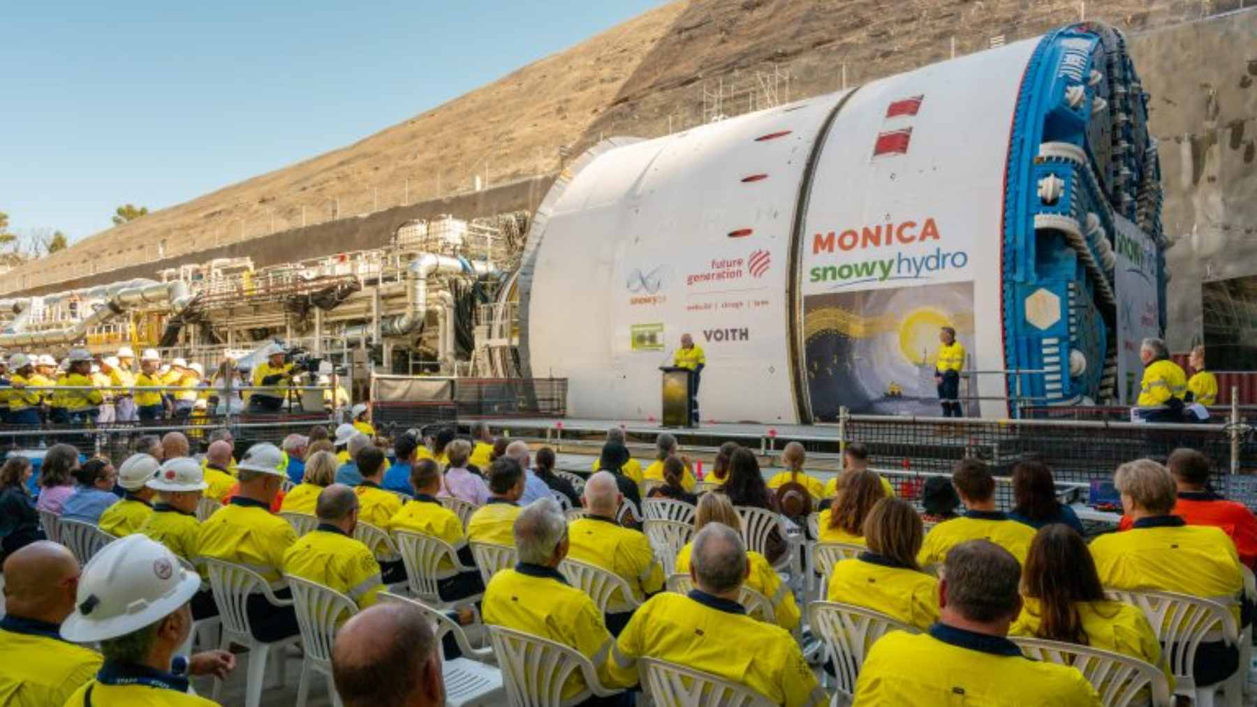 A 152-wheel truck moves a 302,000-lb. tunnel-boring cutterhead, and the logistics look like a megaproject inside another megaproject 1 A massive 152-wheel transport vehicle hauling a 23-foot-wide TBM cutterhead through Cooma streets at night.