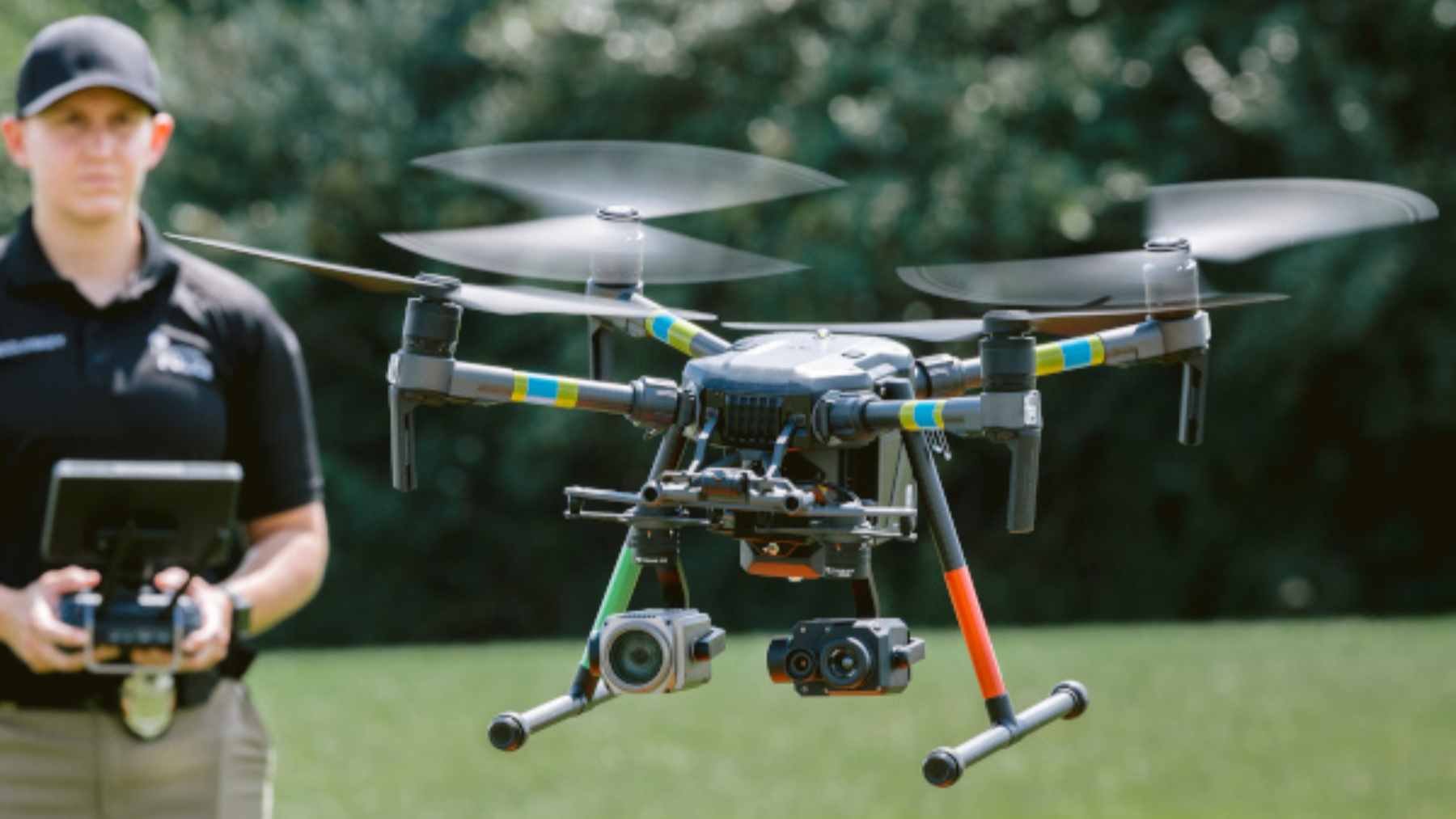 A Flock Safety drone hovering above a residential neighborhood in Stockton, California, as part of a new police surveillance expansion.