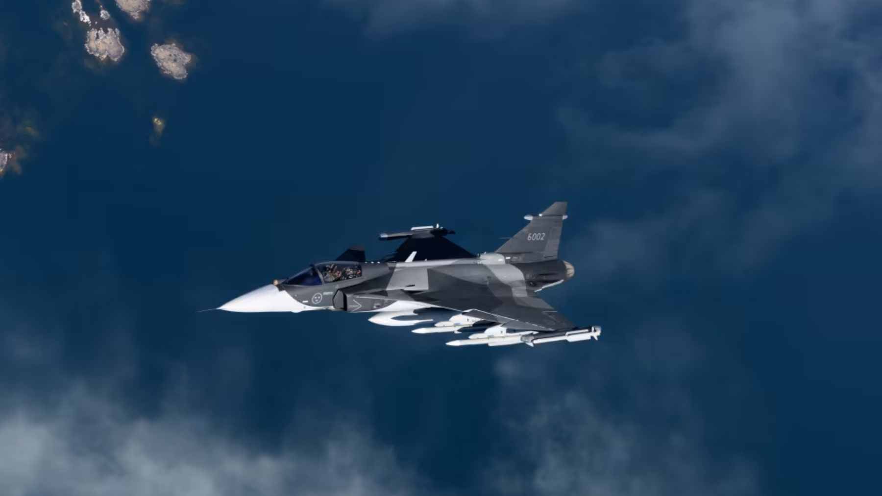 A Swedish JAS 39 Gripen fighter jet performing a short-field takeoff, highlighting its capability for dispersed operations.