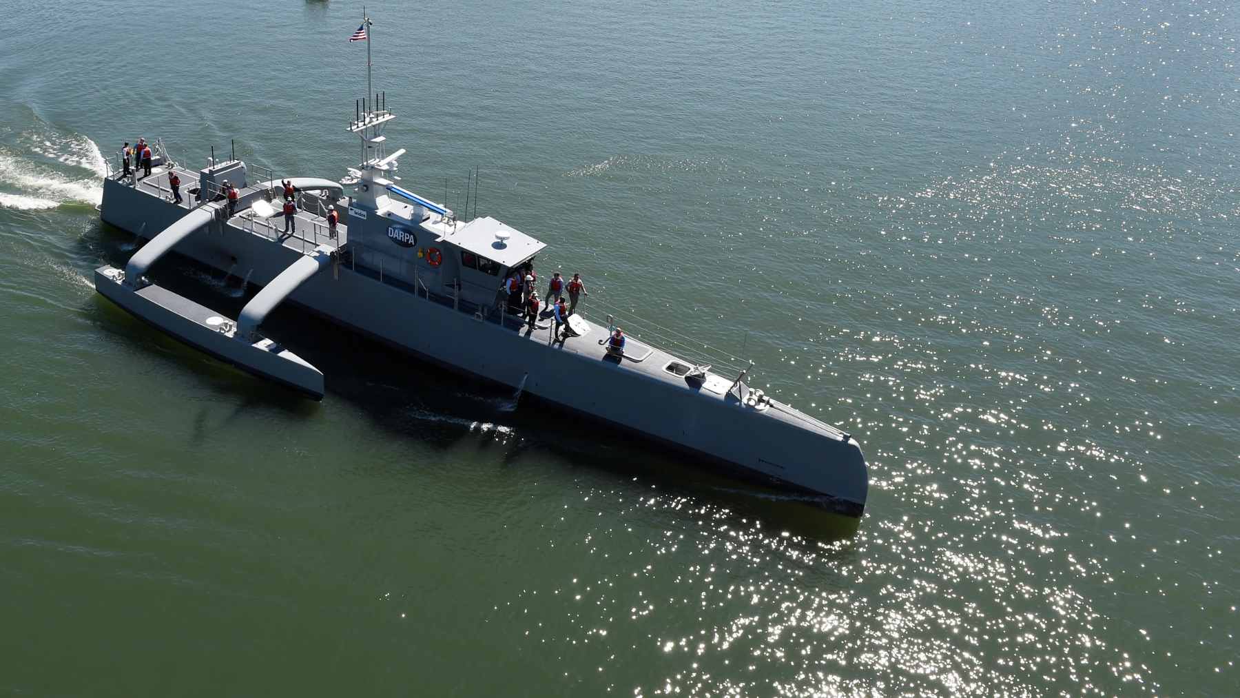 The U.S. Navy's autonomous Medium Unmanned Surface Vessel (MUSV) Seahawk navigating open ocean waters during a training exercise.