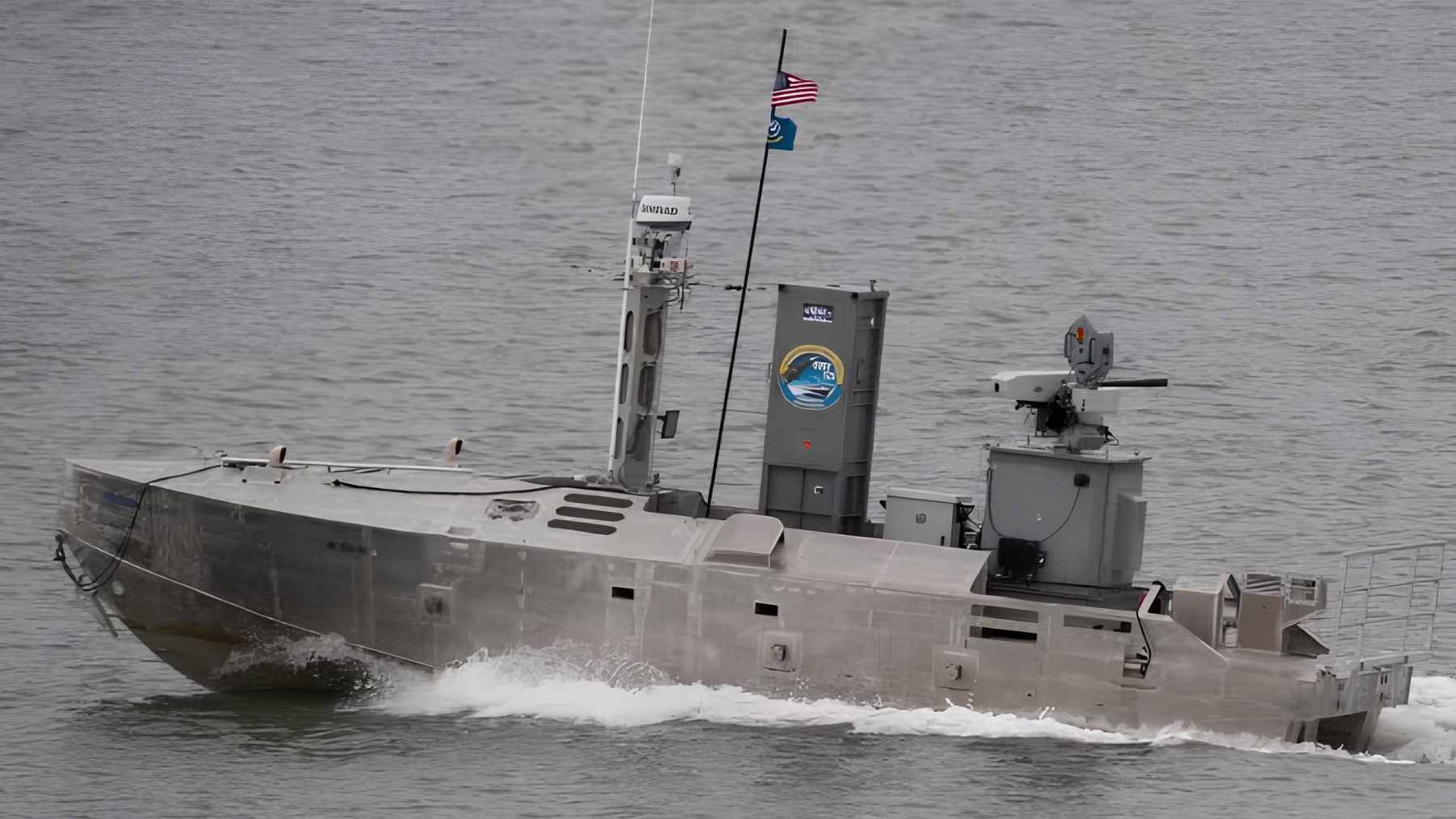 The U.S. Navy's autonomous Medium Unmanned Surface Vessel (MUSV) Seahawk navigating open ocean waters during a training exercise.