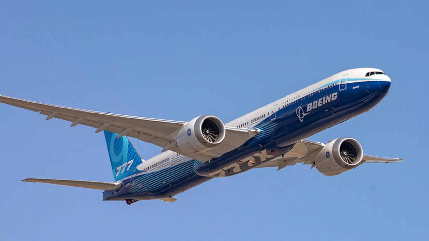 Filmmaker Tyler Perry piloting the 630-pound Ramy RC Boeing 777-9X scale model during its maiden flight.