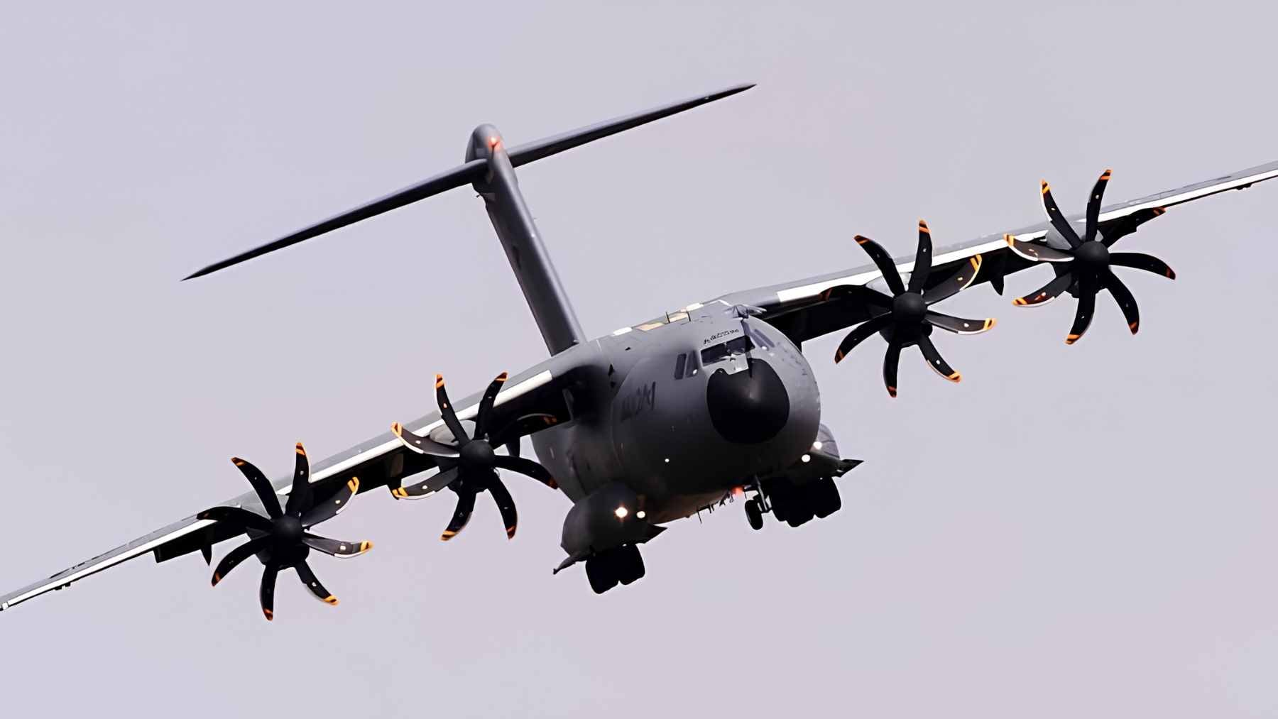 An Airbus A400M military transport aircraft in flight, representing the multinational NATO fleet project that revived production at the Seville assembly line.