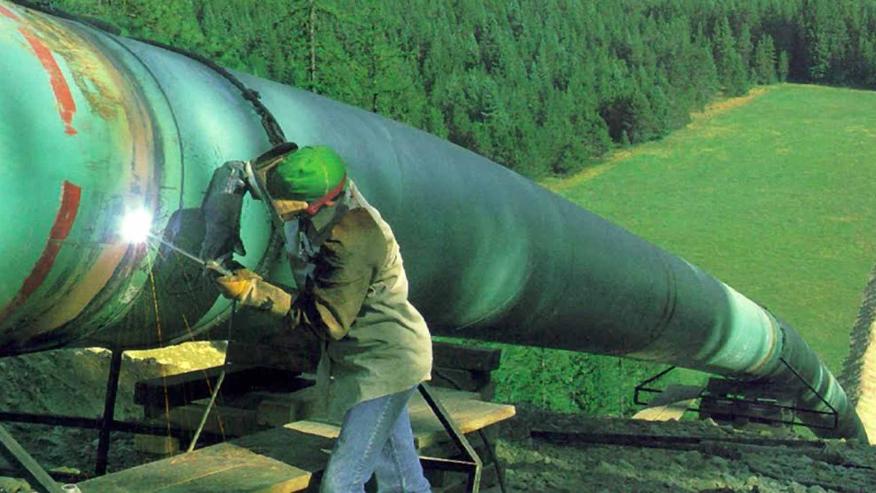A confidential document just revealed the real terms behind one of the world's largest planned gas pipelines in Alaska 2 A view of the Alaskan wilderness where the proposed 807-mile Alaska LNG pipeline is planned to be built, highlighting the massive scale of the energy project.