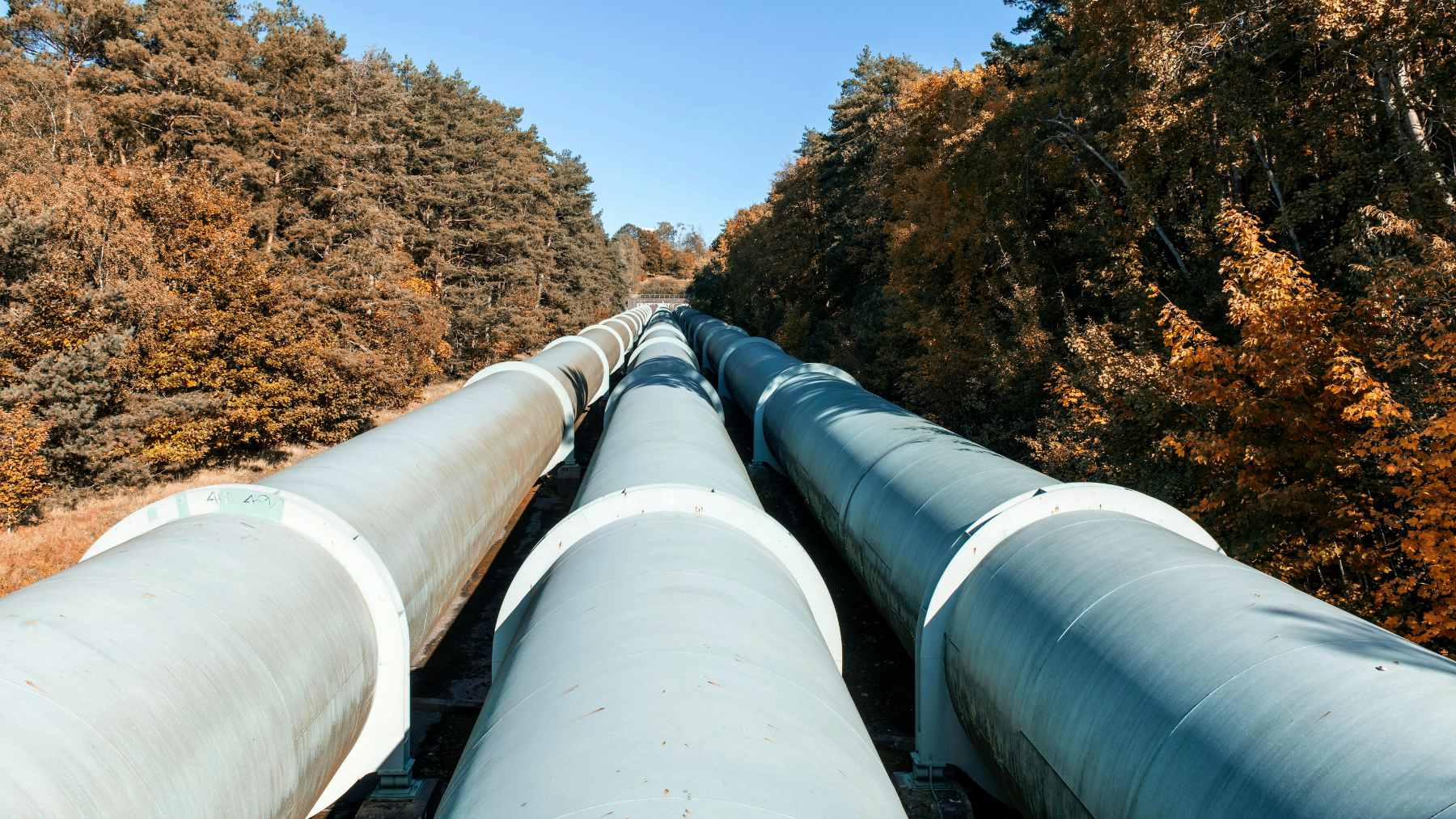 Construction and engineering rendering of a natural gas pipeline project traversing the Patagonian landscape in Argentina.