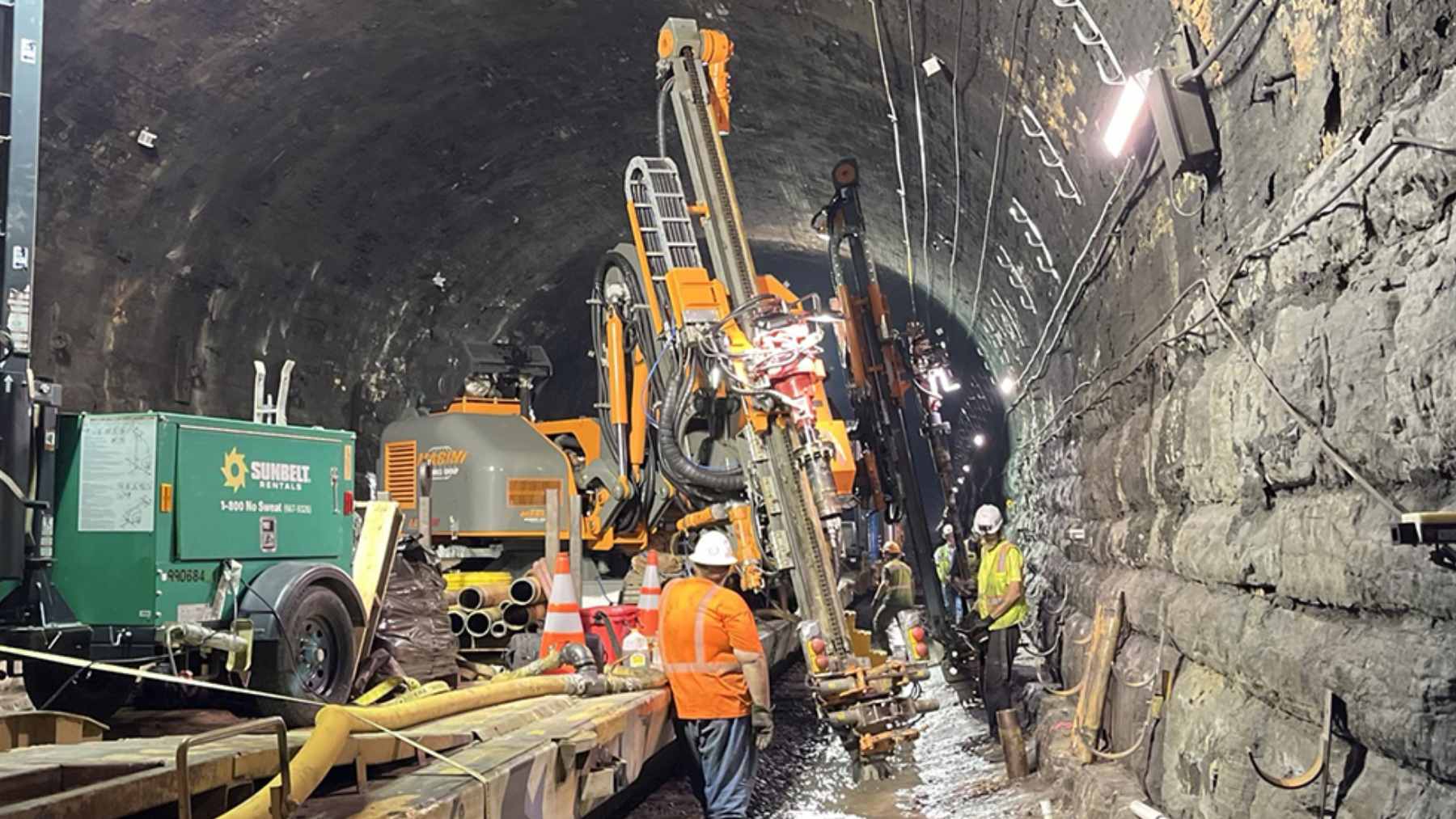 For 130 years, a Baltimore tunnel was too short for double-stacked trains, and hundreds of millions of dollars just changed that 2 A freight train carrying double-stacked shipping containers passing through the newly expanded Howard Street Tunnel in Baltimore.