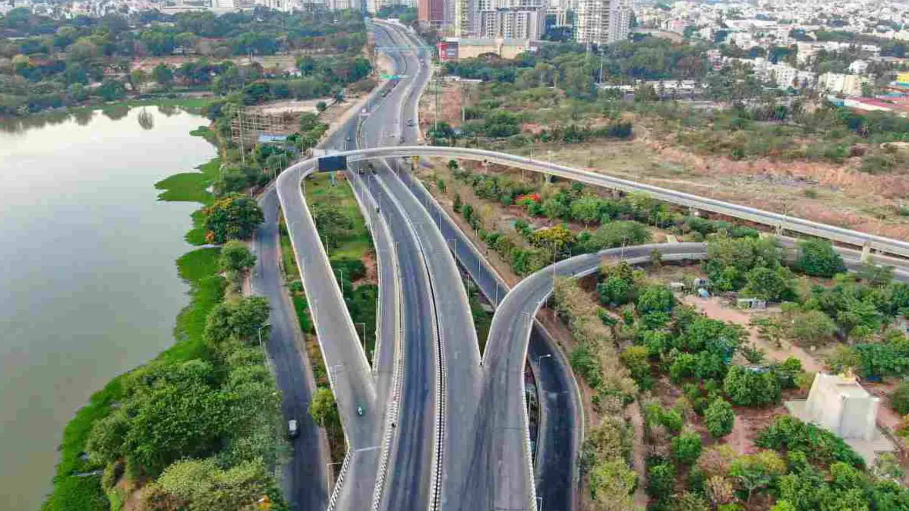 A construction site showing the initial excavation phase for the cut-and-cover tunnel project near Hebbal Junction in Bengaluru.