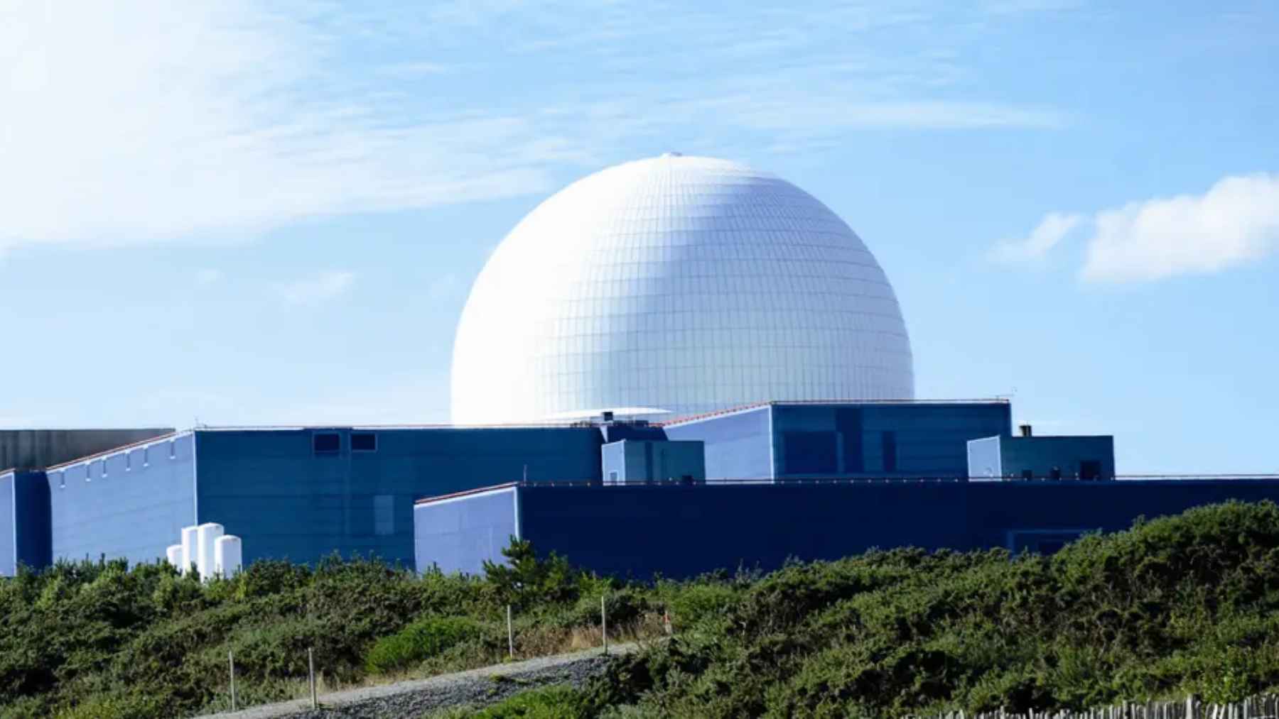 The containment dome and reactor buildings of the Sizewell B nuclear power station on the Suffolk coast in the UK.