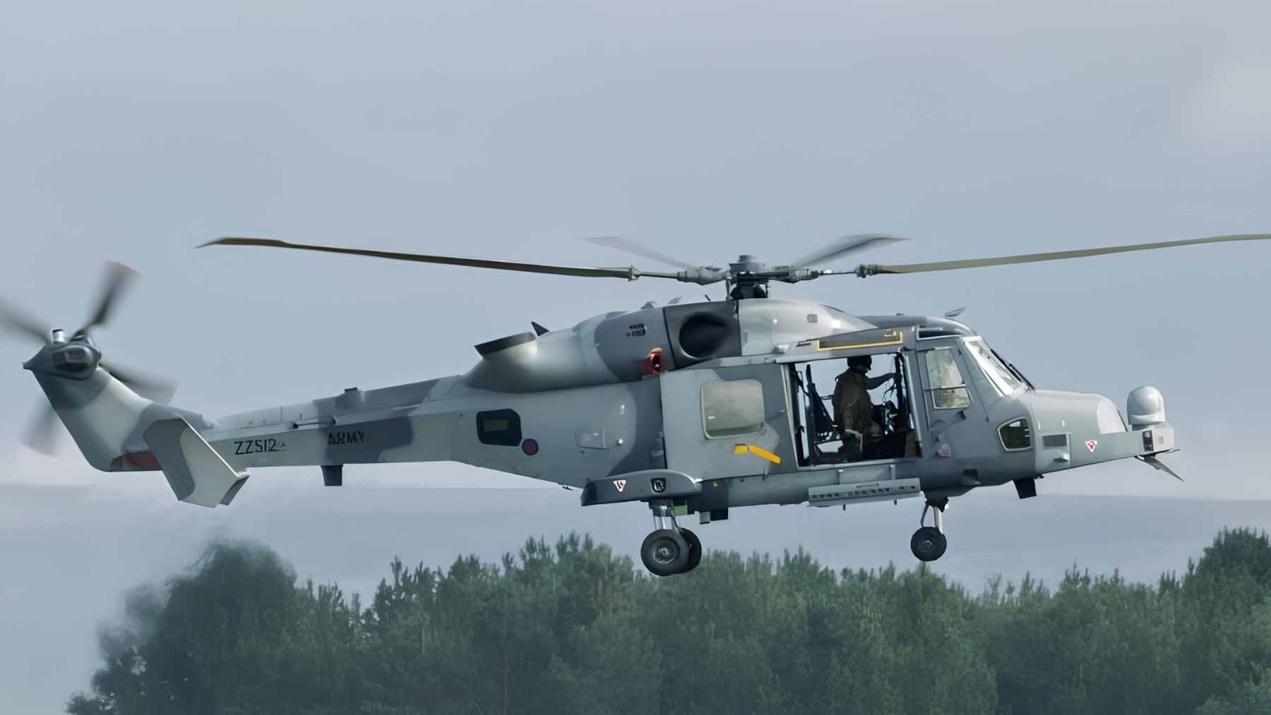 Britain's Wildcat helicopters entered service barely a decade ago, and they're already being quietly replaced by drones 2 A British Army Wildcat AH1 helicopter in flight, highlighting the reconnaissance and utility platform currently slated for phased retirement starting in 2027.
