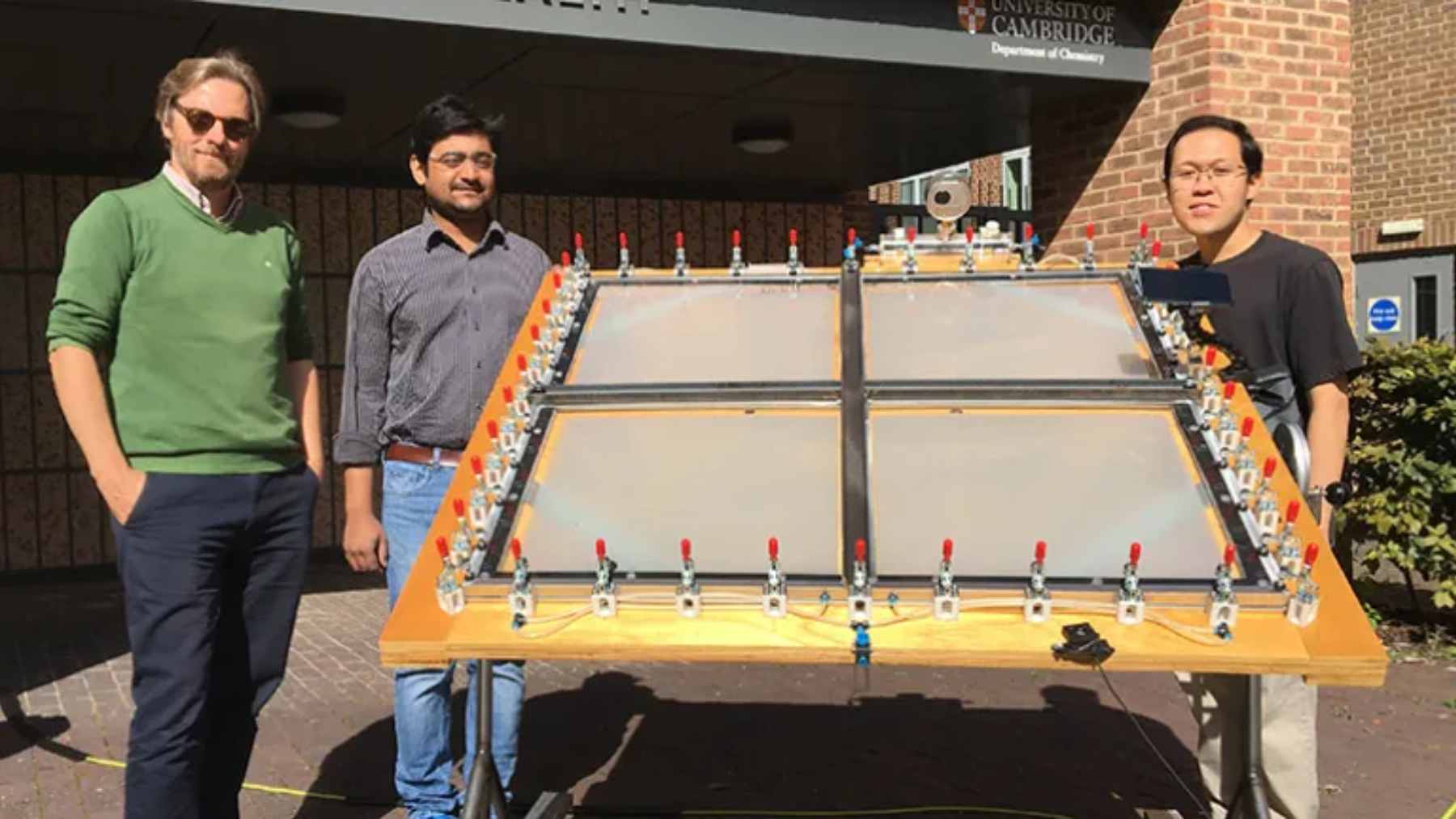 A one-square-meter solar reactor panel tested outdoors, converting common plastic waste into clean hydrogen fuel via sunlight.