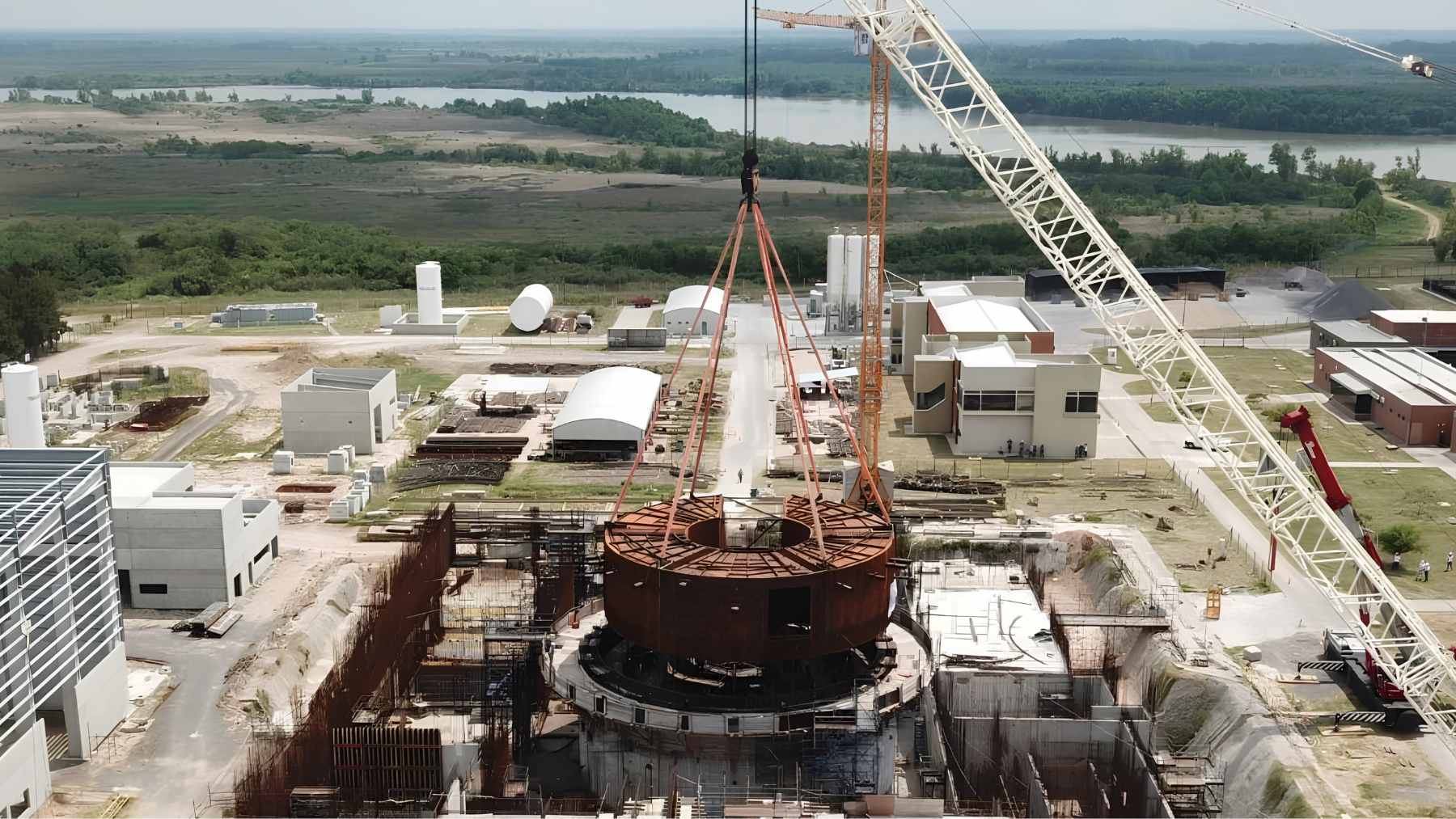 A massive 953-tonne reactor basemat module being lifted by a crawler crane for installation at the Darlington New Nuclear Project site.