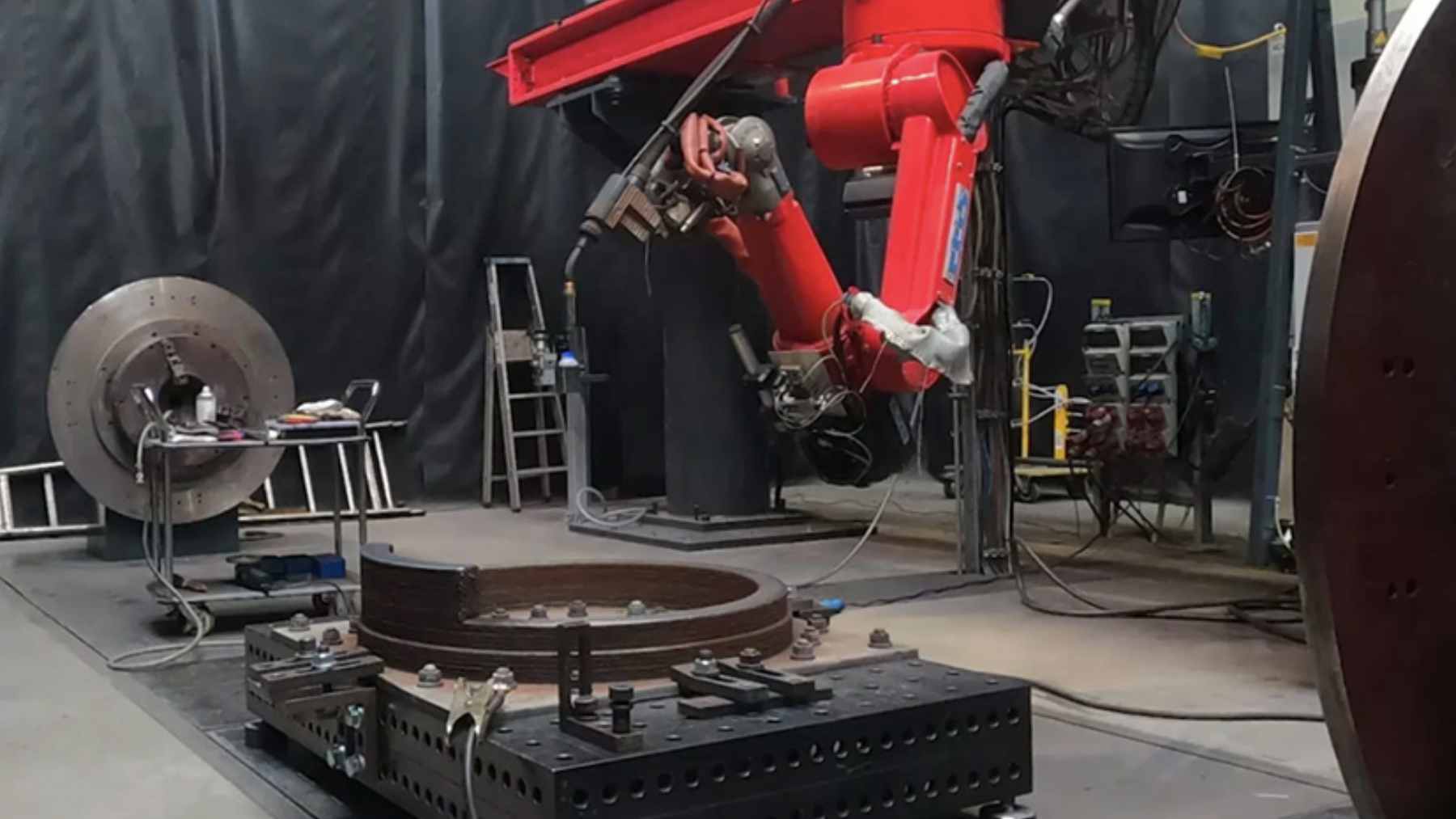 Chile just made a firm move toward naval sovereignty using WAAM 3D-printing, and what it plans to build with it could reshape the region's shipyards 2 A robotic arm performing Wire Arc Additive Manufacturing (WAAM) on a large metal component for maritime and naval applications.