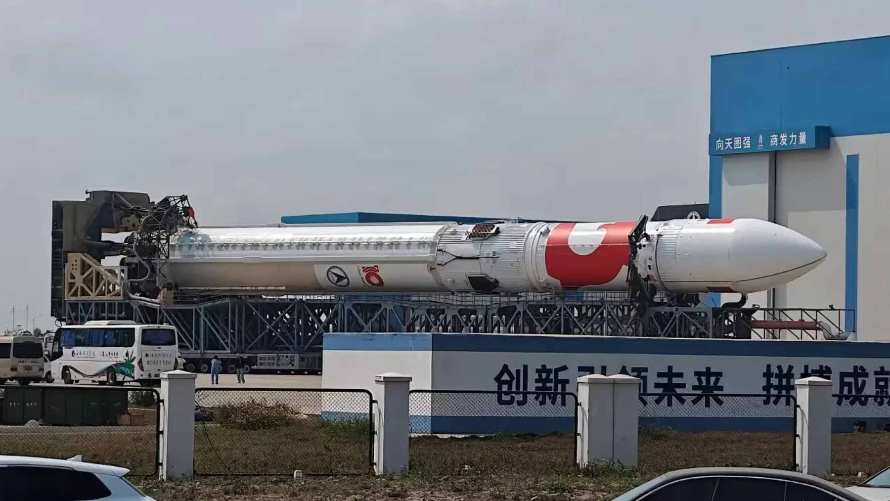 The first-stage booster of a Chinese Long March 10B rocket caught successfully in a high-strength recovery net on a ship at sea.
