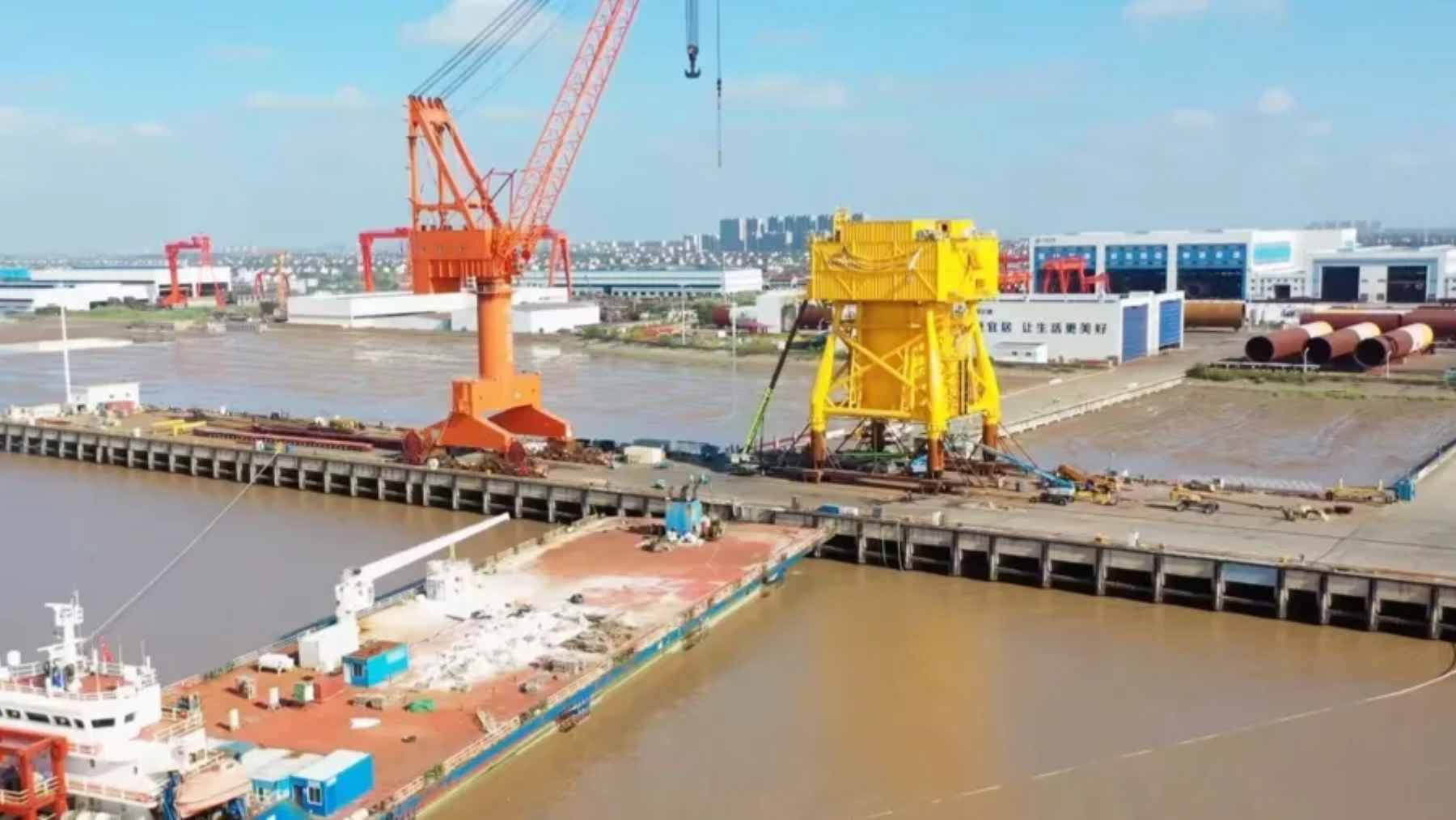 A modular underwater data center submerged off the coast, utilizing offshore wind energy and natural seawater cooling for AI servers.