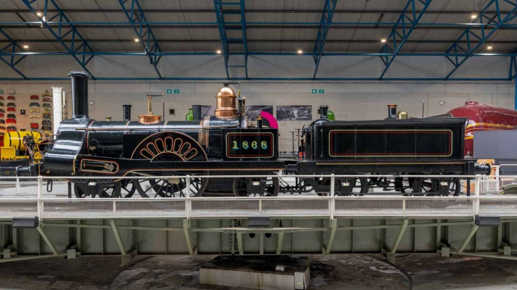 The 1845 steam locomotive Columbine reunited with its tender on the Great Hall turntable at the National Railway Museum in York.