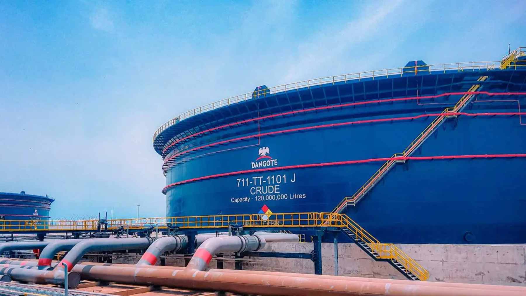 Nigeria's richest man is taking his giant refinery public, and first-time investors are betting on a once-in-a-generation listing 1 An aerial view of the massive Dangote Petroleum Refinery & Petrochemicals complex in Nigeria, symbolizing the country's push for energy independence.