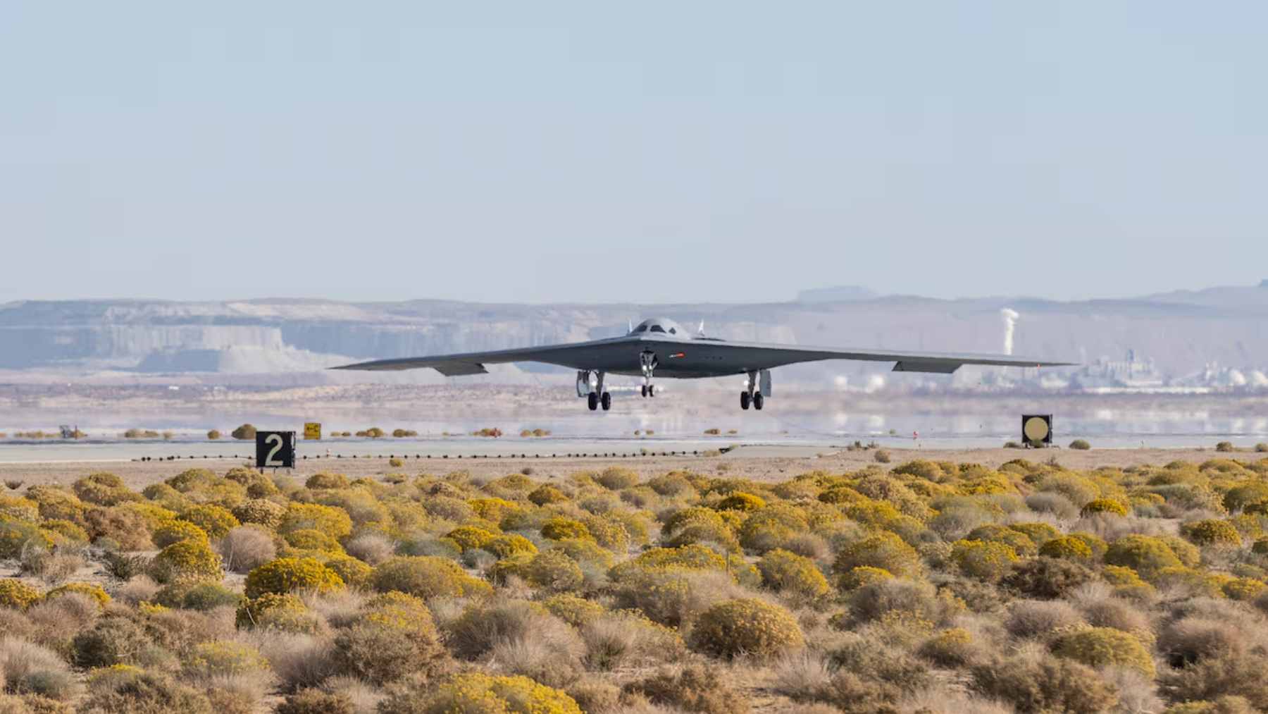 A wide-angle view of the newly constructed low-observable restoration facility at Ellsworth Air Force Base, purpose-built for B-21 Raider maintenance.