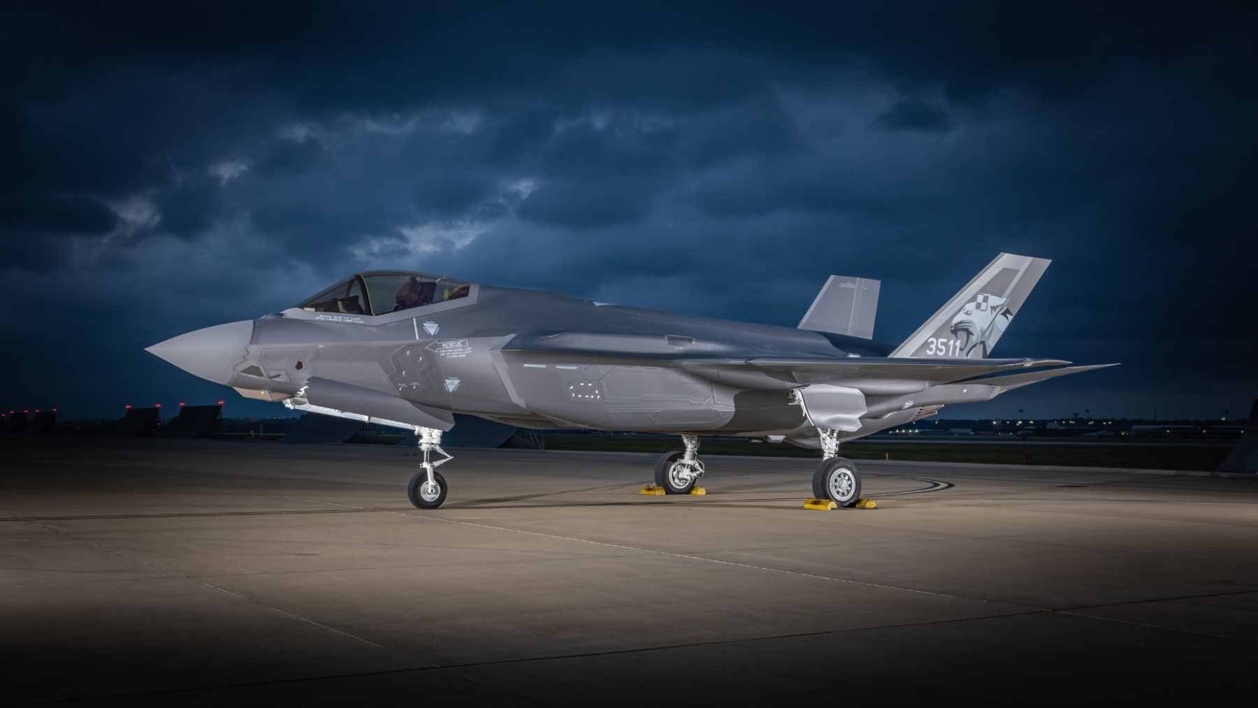 A close-up view of the F-35 Gen III Helmet Mounted Display System, a complex piece of equipment integrated with the jet's sensor and flight data networks.