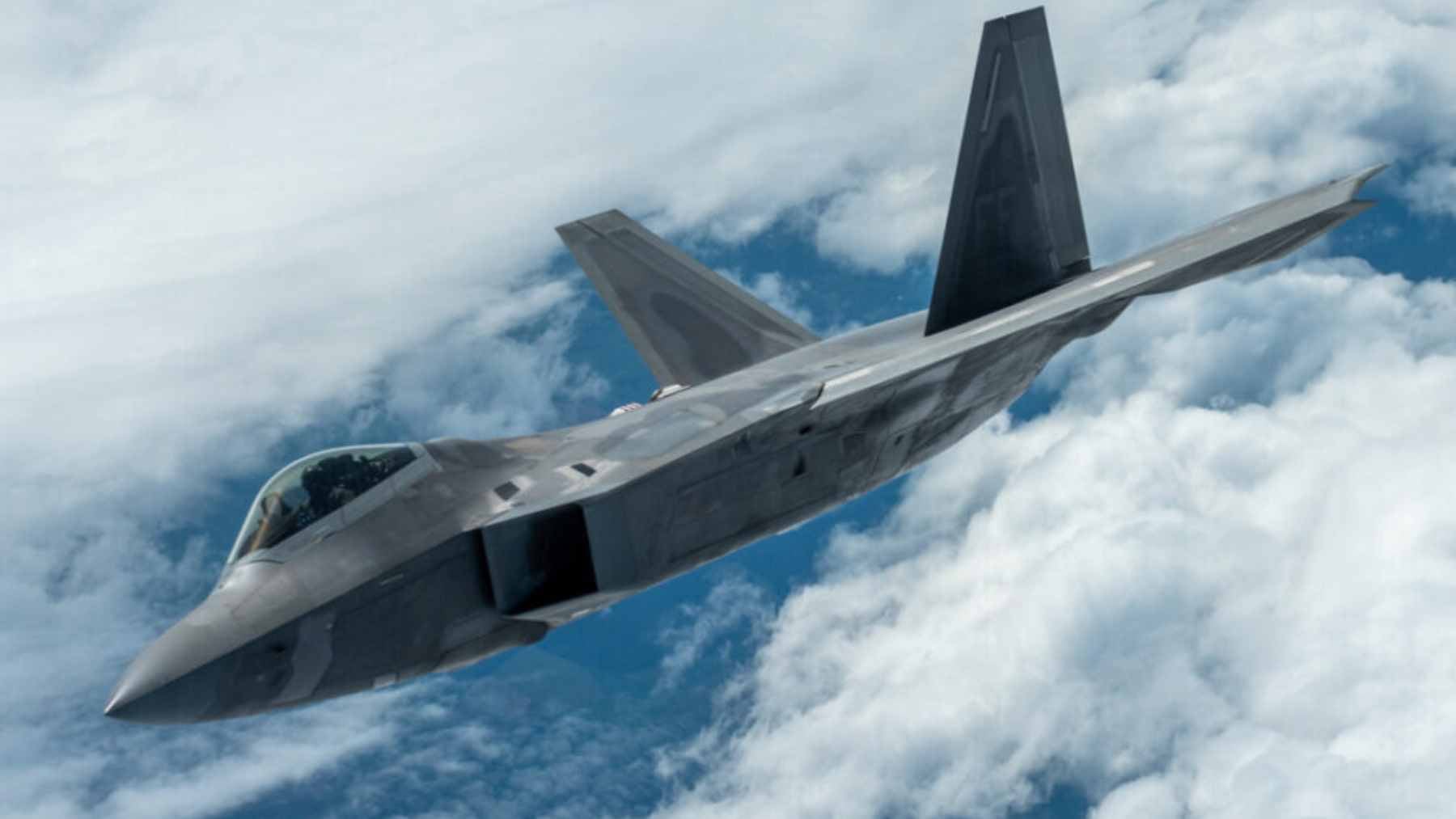 A single software update to the F-22's engine is quietly keeping America's stealth fighter combat-ready into the 2040s, and almost no one noticed 1 A technician reviewing digital diagnostic data on a laptop while working on an F119 turbofan engine of an F-22 Raptor.