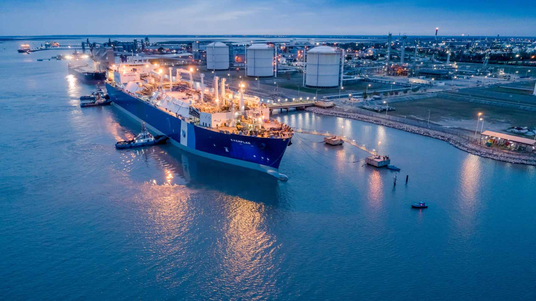 A floating storage and regasification unit vessel moored at a terminal, representing Finland's FSRU Exemplar used to secure liquefied natural gas imports.
