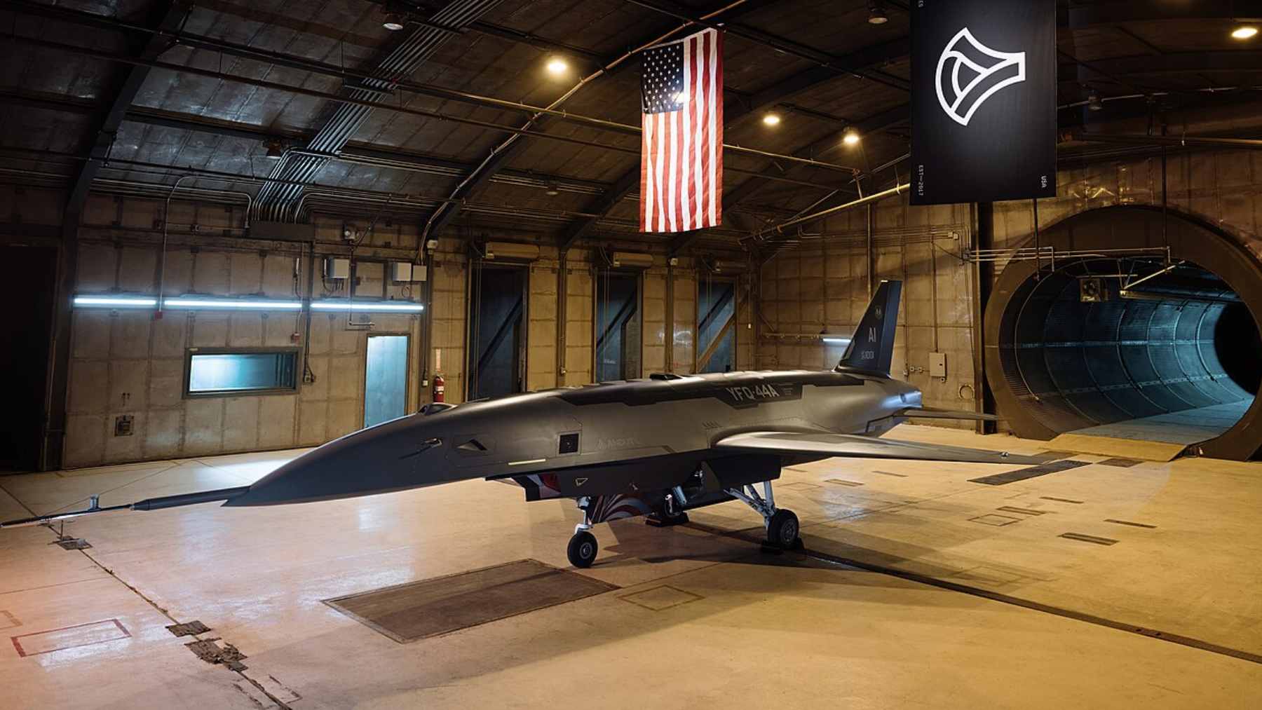 The US Air Force is building its first semi-autonomous fighter, the FQ-44 Fury, to fly as a loyal wingman beside the F-35 and F-22 1 The Anduril FQ-44 Fury, a semi-autonomous loyal wingman aircraft, performing a tactical flight maneuver alongside a crewed fighter jet.