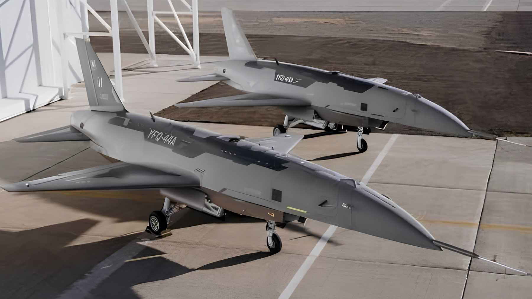 The Anduril FQ-44 Fury, a semi-autonomous loyal wingman aircraft, performing a tactical flight maneuver alongside a crewed fighter jet.