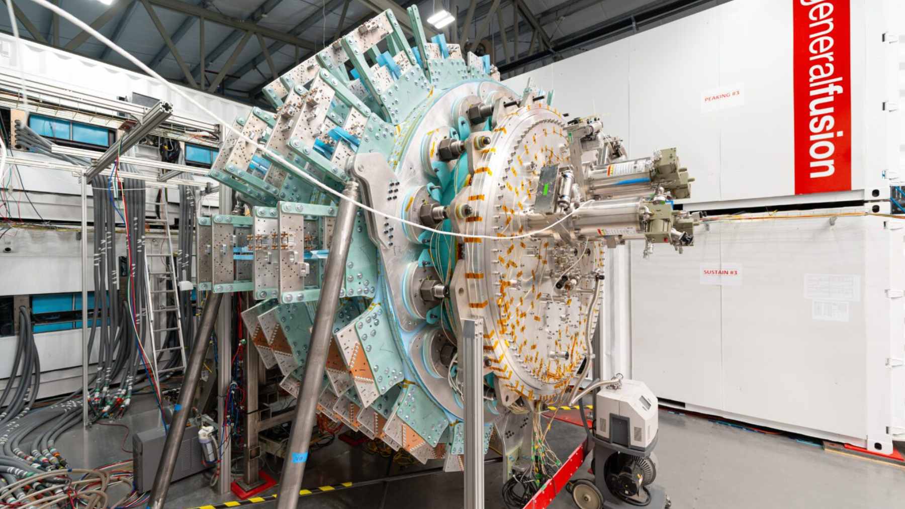 A Canadian fusion machine just tripled its plasma temperature to 8.4 million°C by crushing it, and the method is not what reactors usually use 1 The LM26 fusion machine chamber, showing the compression assembly used for Magnetized Target Fusion tests.