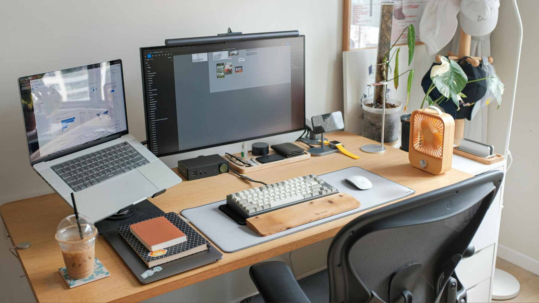 An organized home office desk setup featuring a laptop stand, external keyboard, mouse, and affordable tech accessories.
