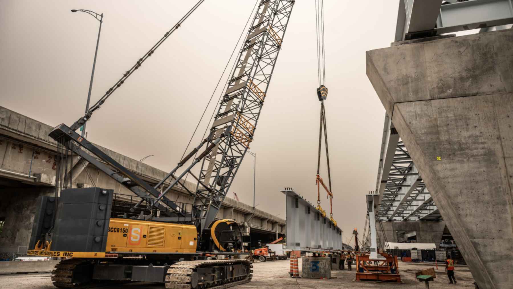 Quebec has now finished all 46 piers of the new Île-aux-Tourtes Bridge, one of its biggest projects 2 A marine construction site showing completed concrete piers for the new Ile-aux-Tourtes Bridge crossing over Lake of Two Mountains in Quebec.